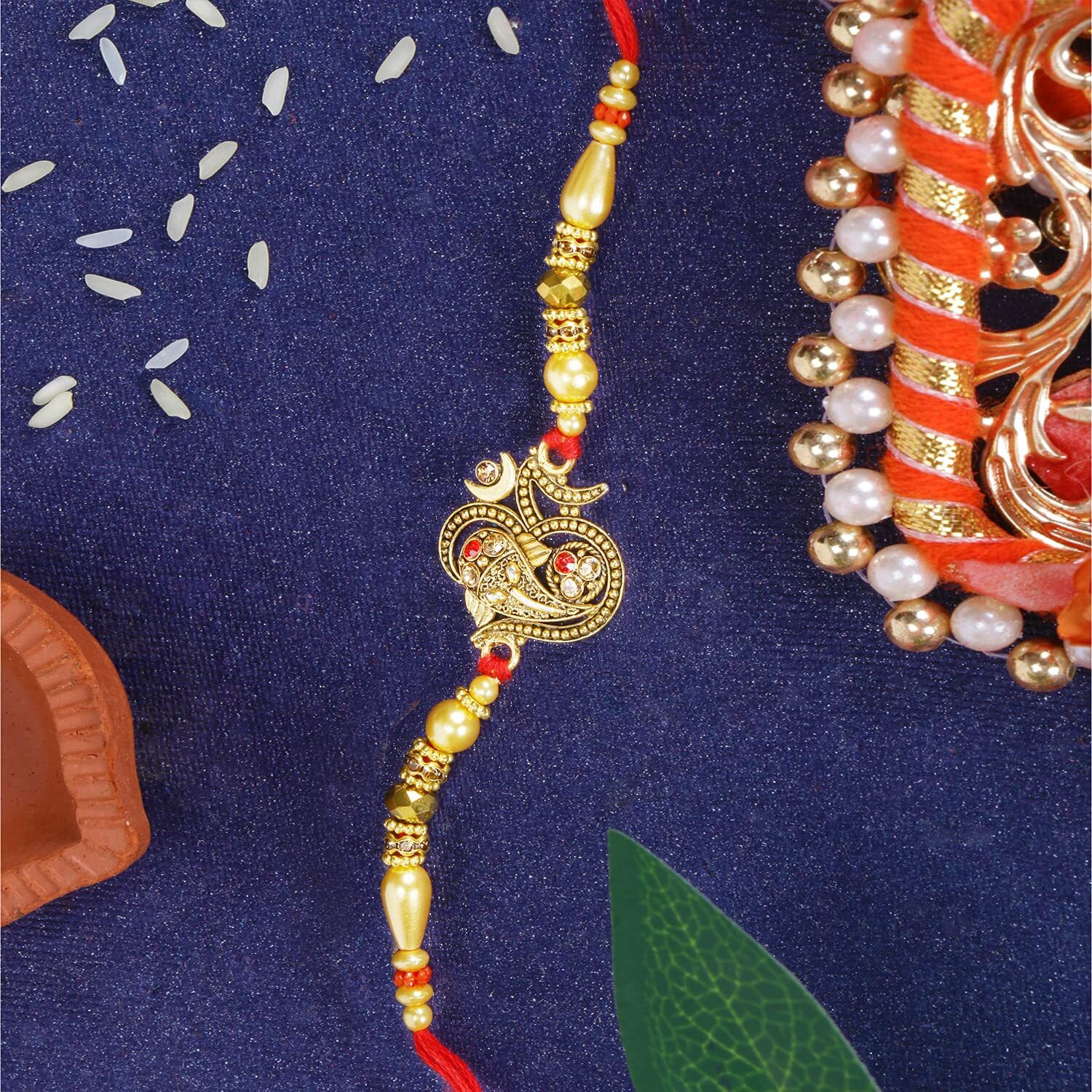 Riddhika Ventures Glorious Gold Plated Om and Diamond Ring Rakhi (Bracelet) with Roli Chawal and Greeting Card (K15) For Men