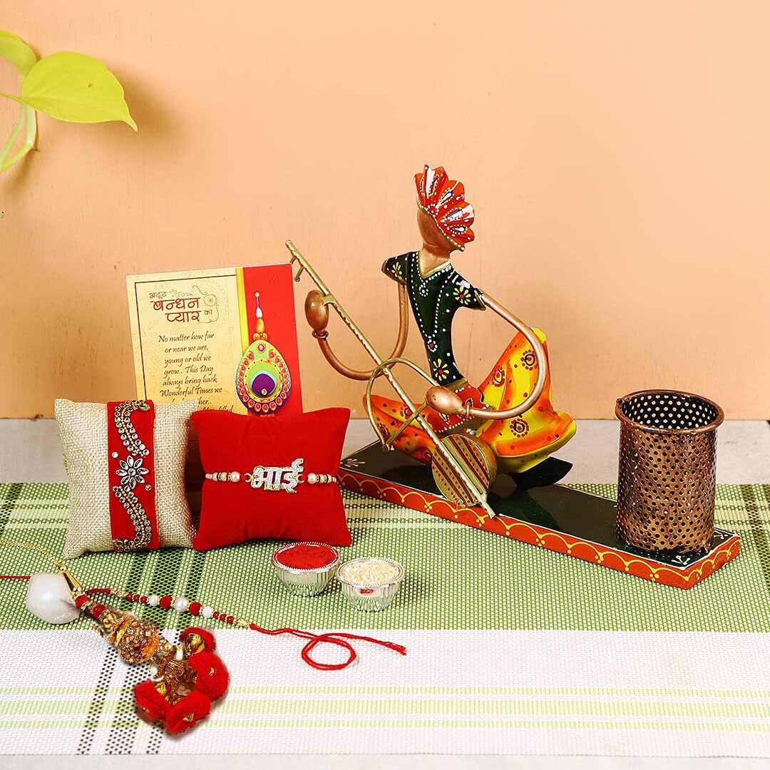 Rakhi for Brother bhai with Musician men pend stand Gift Combo Set - Rakhi for Bhaiya Bhabhi Kids - Rakshabandhan Showpiece - Musician Pen Stand Holder Decorative Showpiece Dora Rakhi Bhai Rakhi Lumba Velvet Rakhi, Greeting Card