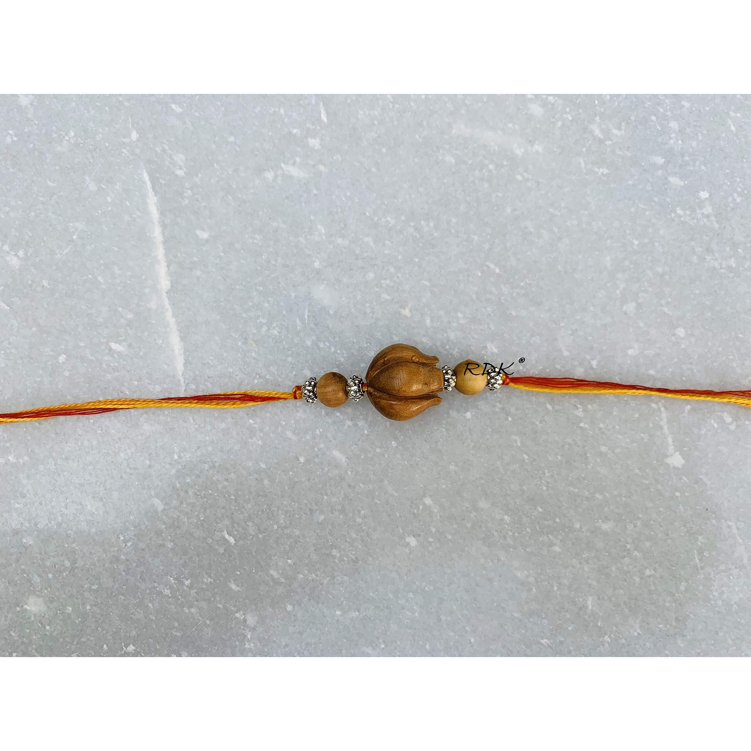 RDK Womens Handcrafted Sandalwood Antique Lotus Beaded Pattern Dora Rakhi