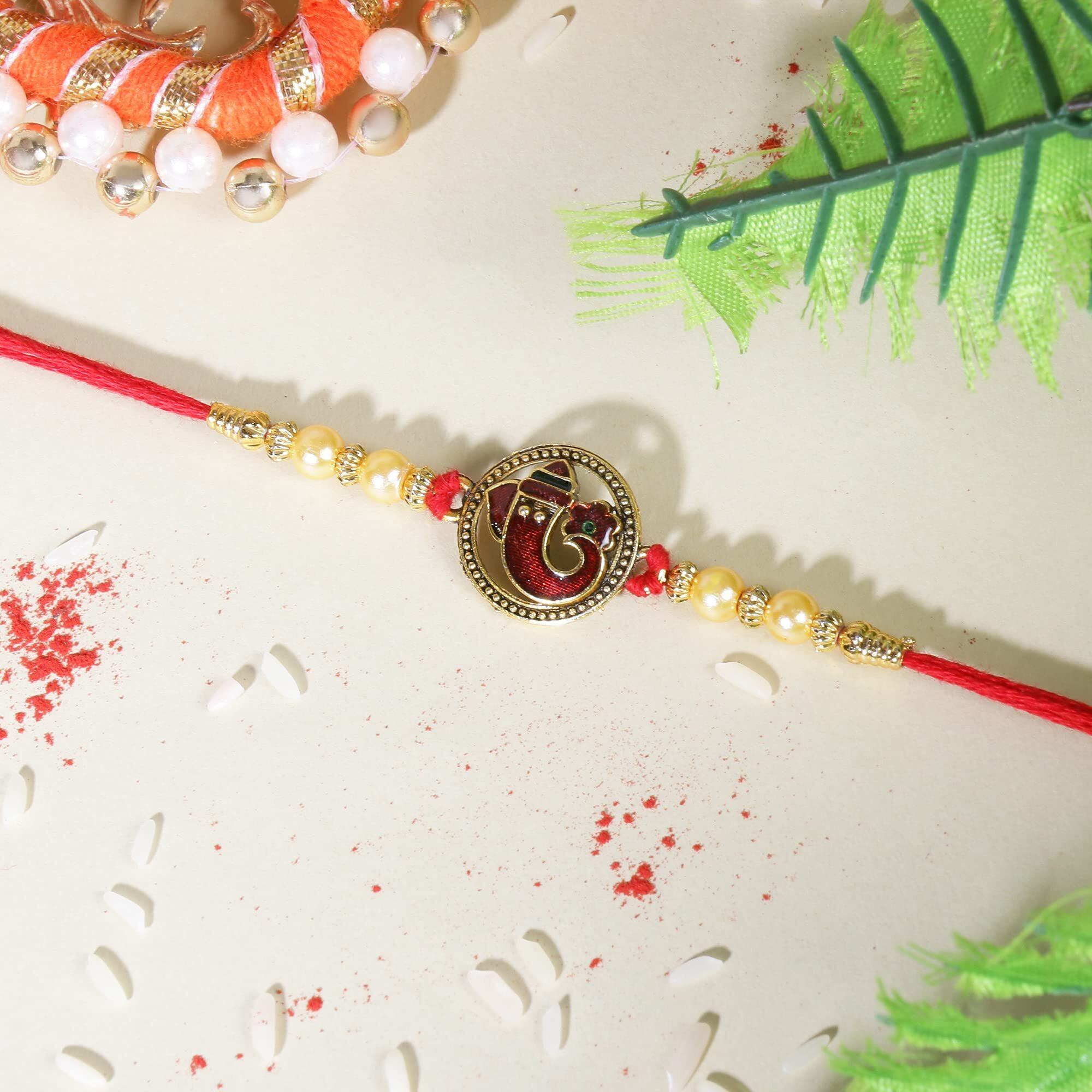 Riddhika Ventures Stunning Gold Plated Designer Brothers Rakhi with Roli Chawal and Greeting Card (G1)