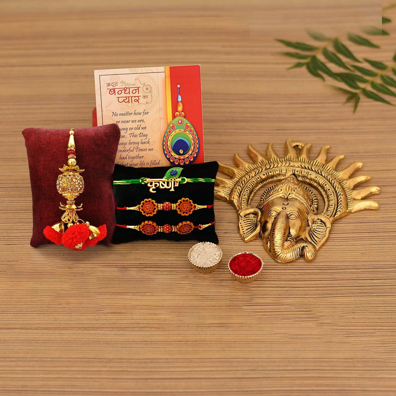 Collectible India Raksha Bandhan Gift Hamper For Brother With Ganesha Wall Hanging Showpiece With 4 Rakhi (Krishna Rakhi, Rudraksh Rakhi, Lumba Rakhi) With Colorful Greeting Card