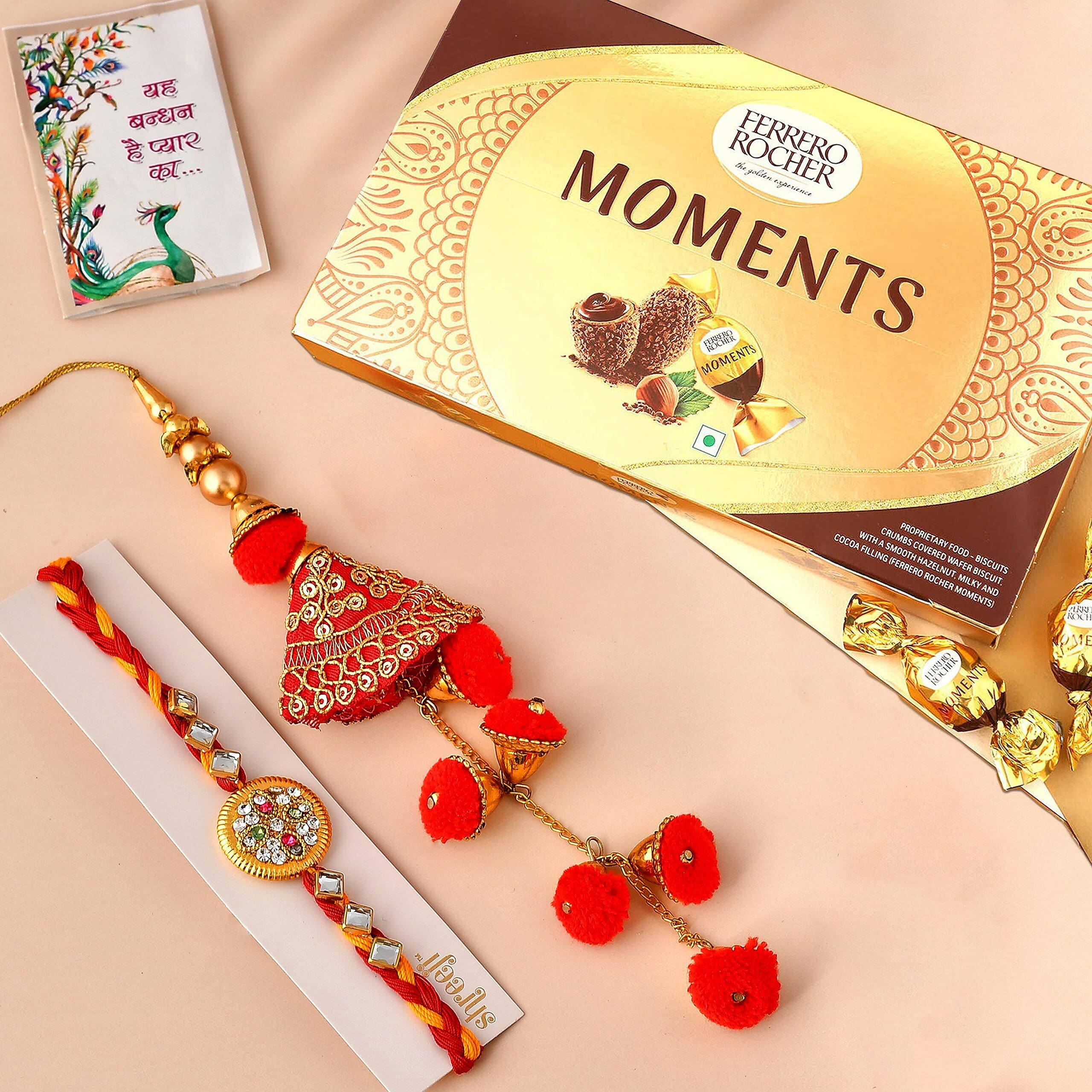 CraftVatika Rakhi Ferrero Chocolate Gift Box for Brother and Bhabhi, Rakhi Combo Set of 2 with Ferrero Moments Chocolates for Brother, Pom Pom Lumba Rakhi, Designer Rakhi with Ferro on Raksha bandhan