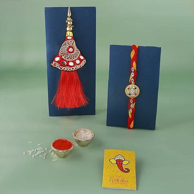 CraftVatika Rakhi Ferrero Chocolate Gift Box for Brother and Bhabhi, Rakhi Combo Set of 2 with Ferrero Moments Chocolates for Brother, Pom Pom Lumba Rakhi, Designer Rakhi with Ferro on Raksha bandhan