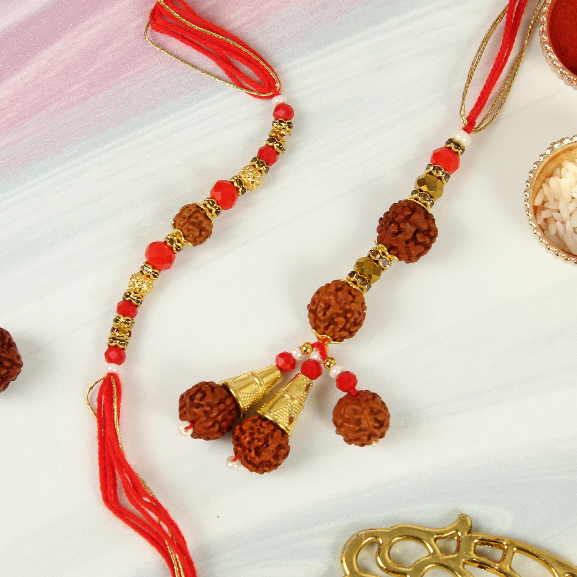 TIED RIBBONS Rakhi with Sweets for Brother and Bhabhi - Designer Rakhi with Soan Papdi Sweet Gift Pack and Roli Chawal - Rakhi for Brother and Bhabhi