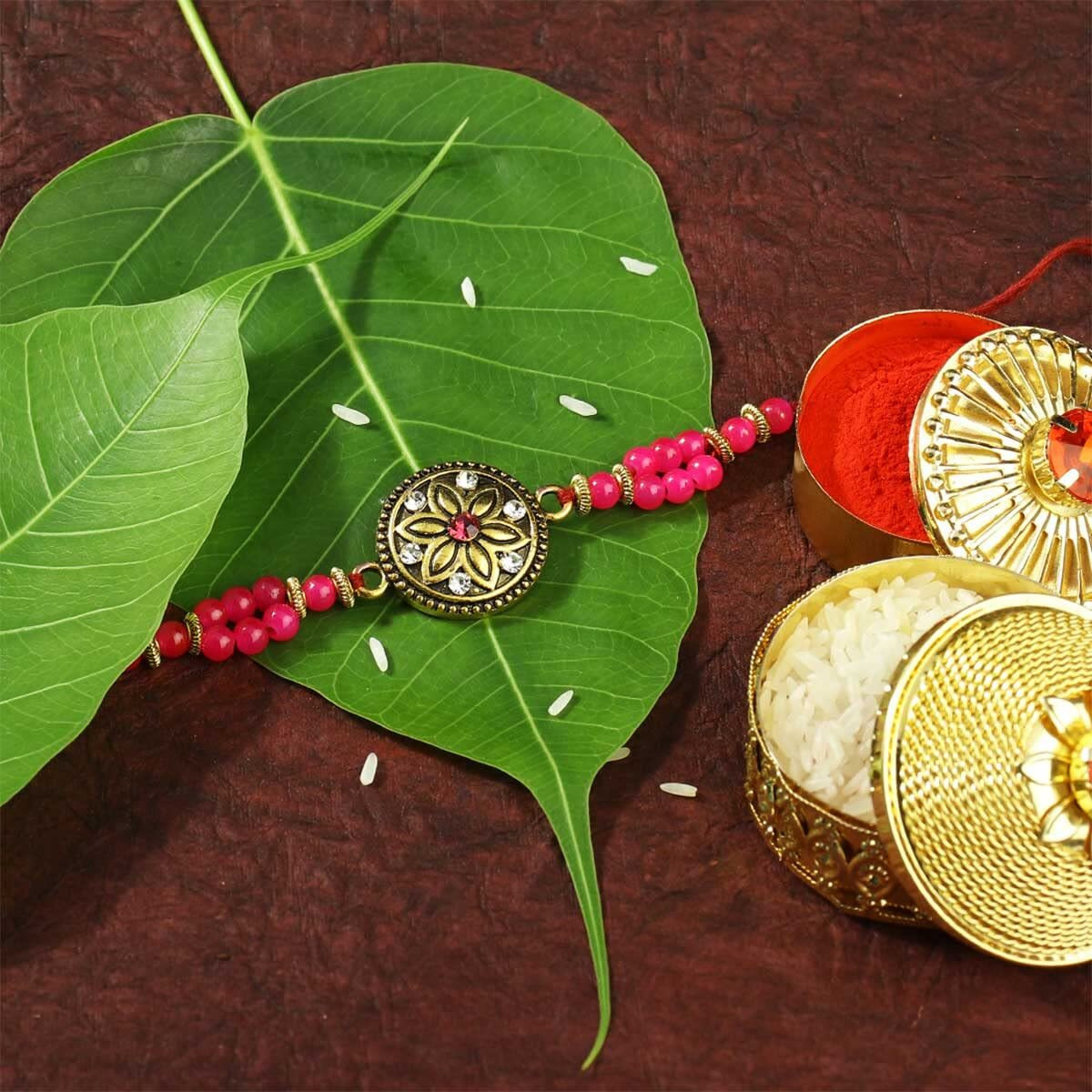 Aheli Traditional Gold Plated Designer Pearl Rakhi With Rakshabandhan Greeting Card For Men Boys