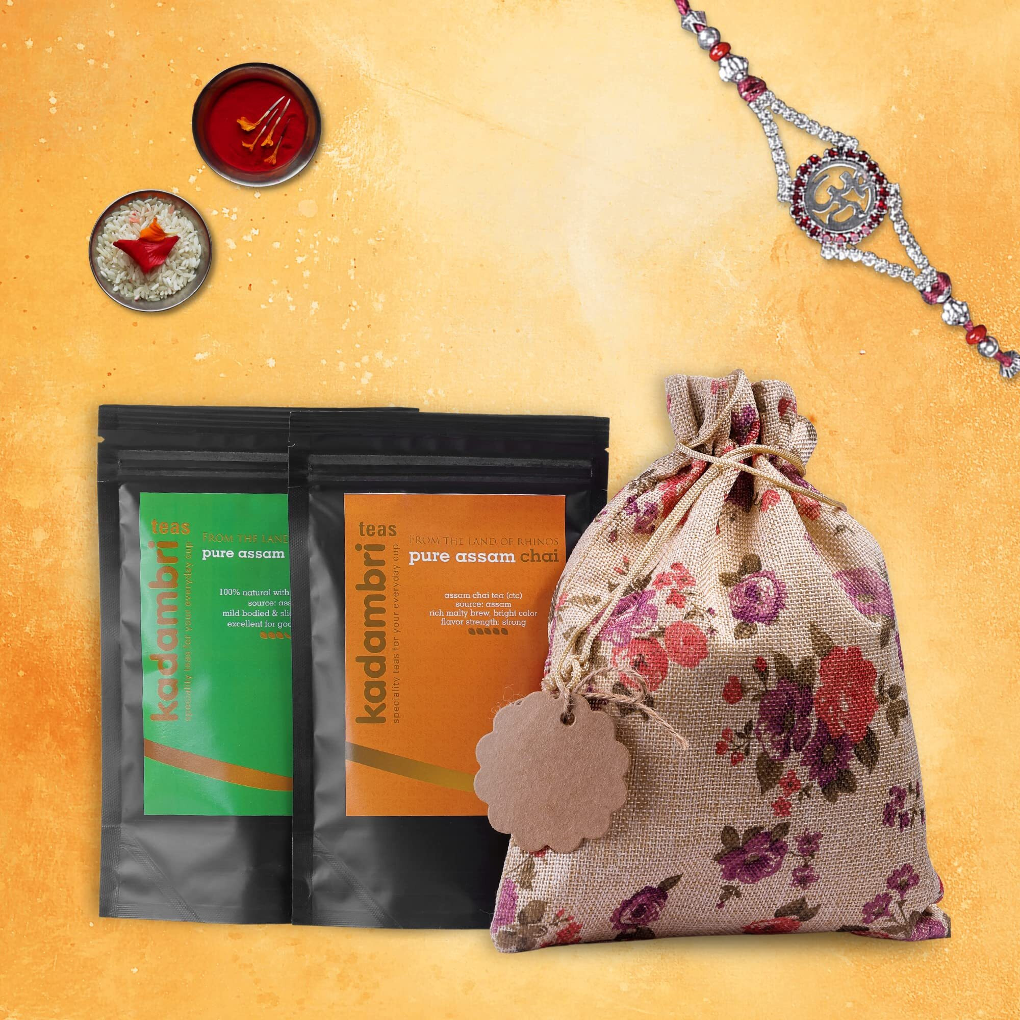Kadambri Teas Rakhi For Brother With Gift Combo Set || Luxury Rakshabandhan Gift Hamper || Gift Box Contains 1 Premium Green Tea, 1 Pure Assam Chai, 1 Rakhi, Roli Chawal In Floral Linen Jute Bag (1 Rakhi)