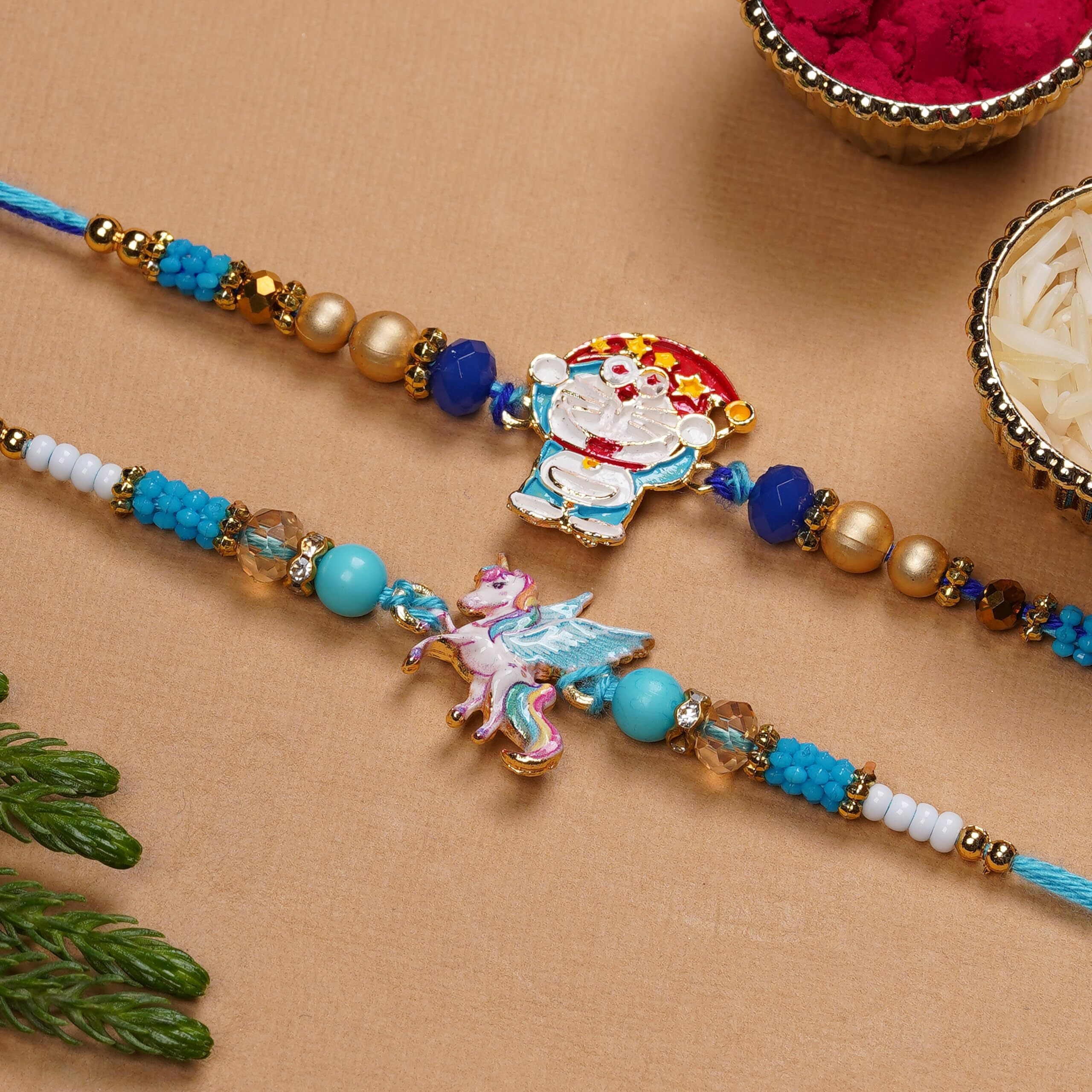 Finemoe 2 Pc Unicorn And Dora Rakhi Set For Brother, Kids Cartoon Thread Bracelets Combo, Handmade Resin Charm Child Rakshabandhan Hamper With Complimentary Roli Chawal, Festive Gift Kit For Children