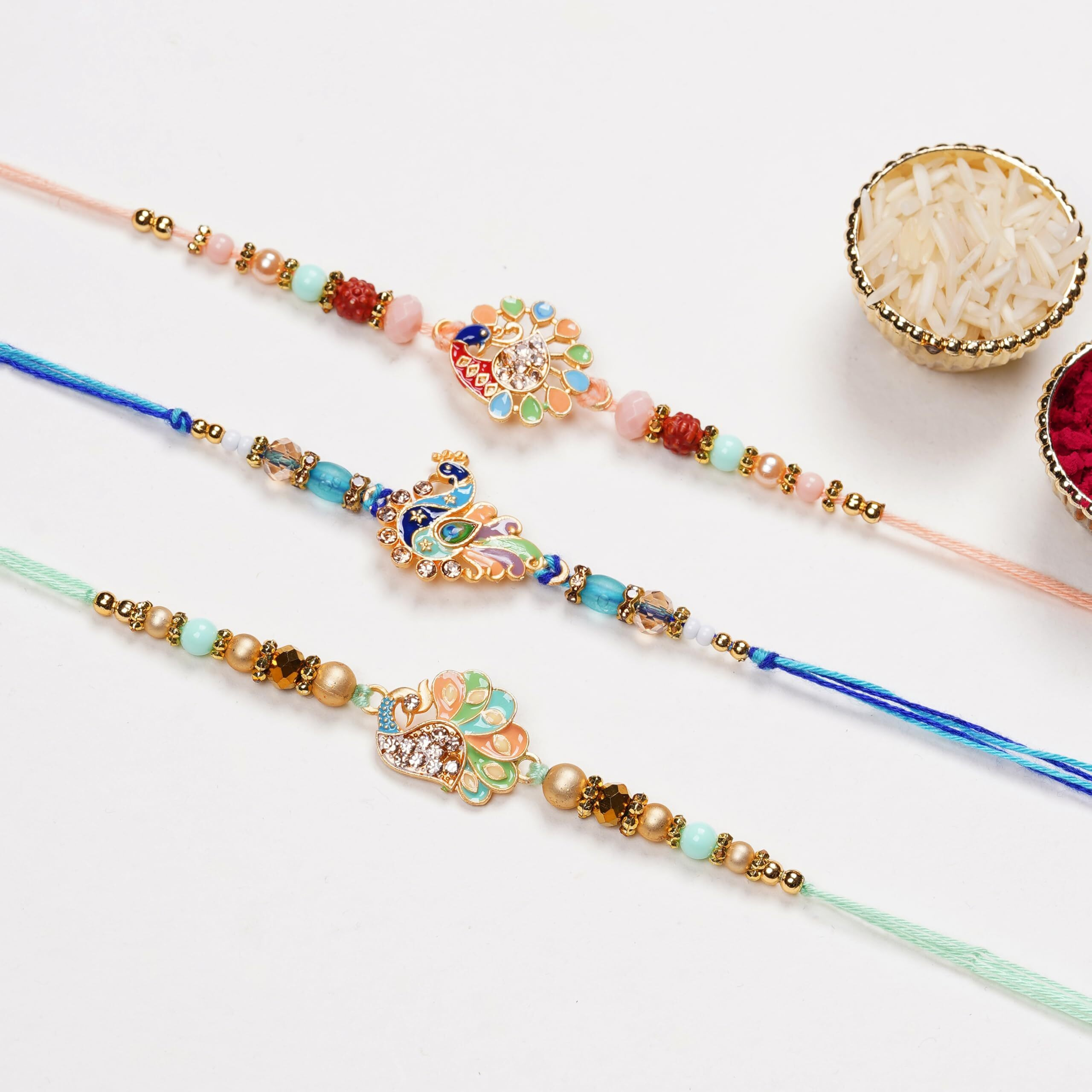 Finemoe Set Of 3 Colorful Designer Rakhi For Brother With Roli Chawal Pack - Elegant Handmade Rakhis With Peacock Motif, Delicate Beads & Thread Work, Traditional Rakshabandhan Gift For Bhai, Bhaiya