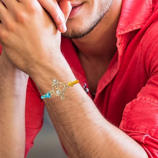 Estele Gold Plated Auspicious Om Bracelet With Austrian Crystals And Multi Colored Thread For Valentines Day Gift