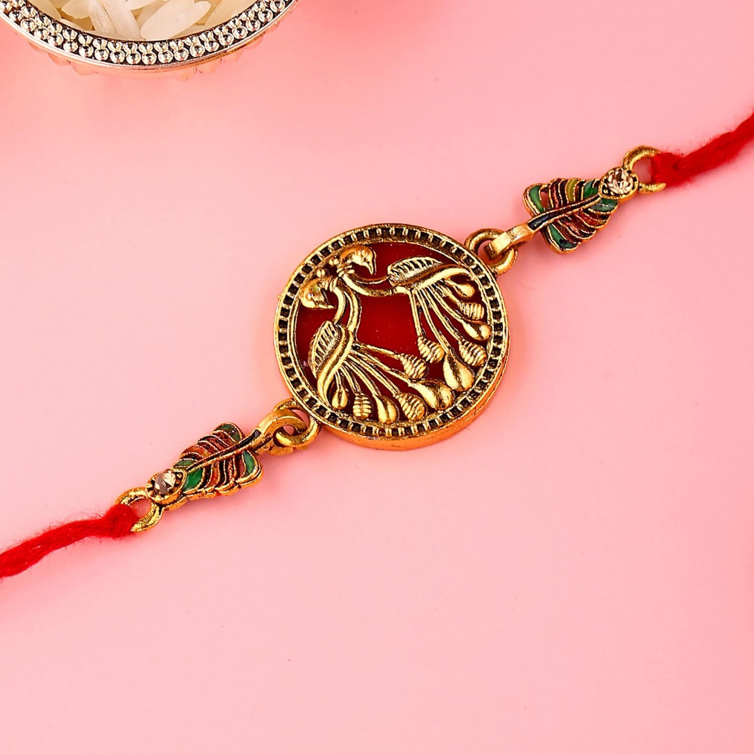 Voylla Designer Gold Toned Peacock Rakhi With Roli Chaawal Pack