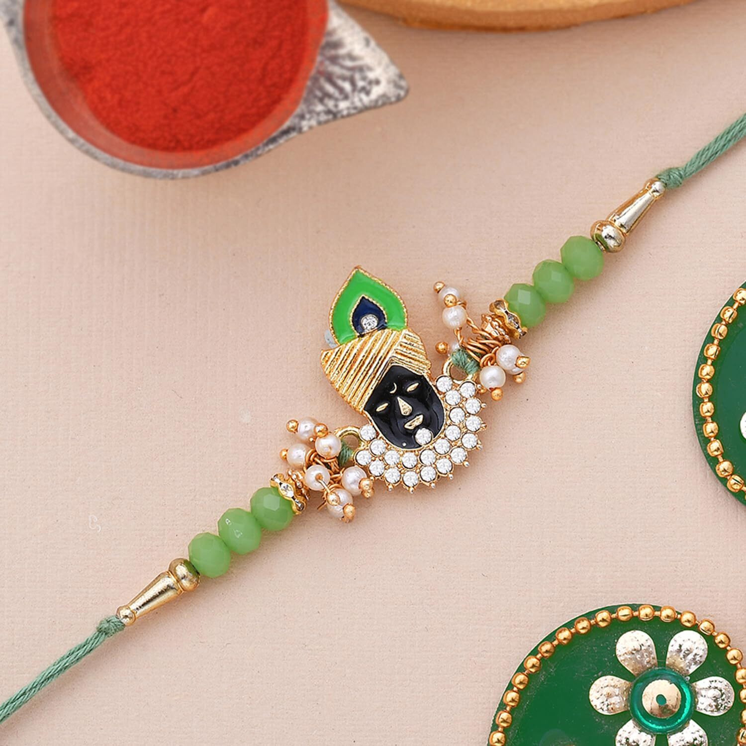 Voylla Deity Inspired Green Beads Embedded Lord Krishna Rakhi