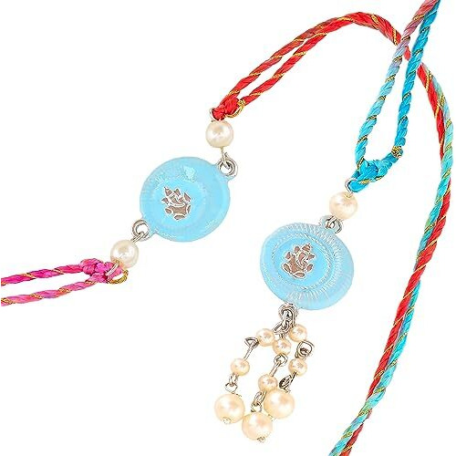 Estele Rhodium Plated Divine Ganesh Adjustable Rakhi Set For Bhaiya & Bhabhi With Blue Enamel And White Pearls With Multi-Colored Silk Thread