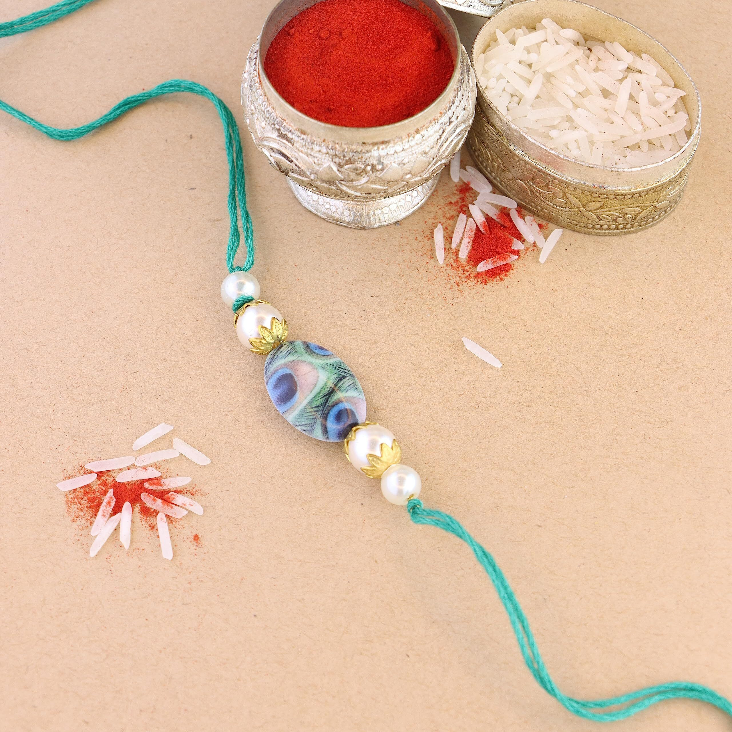 I Jewels Pearl & Peacock Feather Designer Bhaiya Rakhi With Roli Chawal For Brother/Bro/Men With Rakshabandhan Card (R103-3) (Pack Of 3)