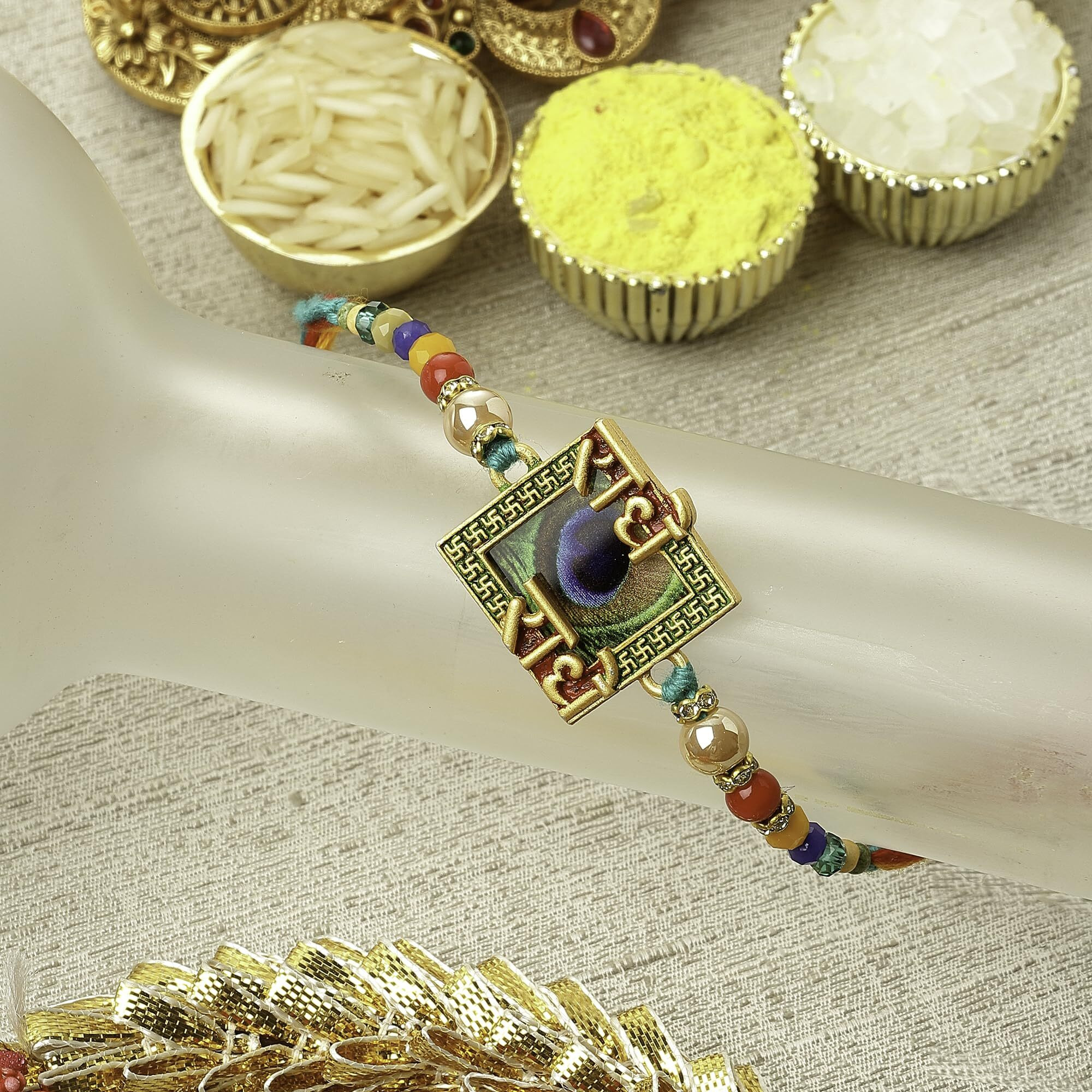 Zeneme Rakhi For Bhaiya Radhe Radhe Mor Pankh With Beads Stringed Rakhi For Bhai With Roli Chawal And Raksha Bandhan Greeting Card