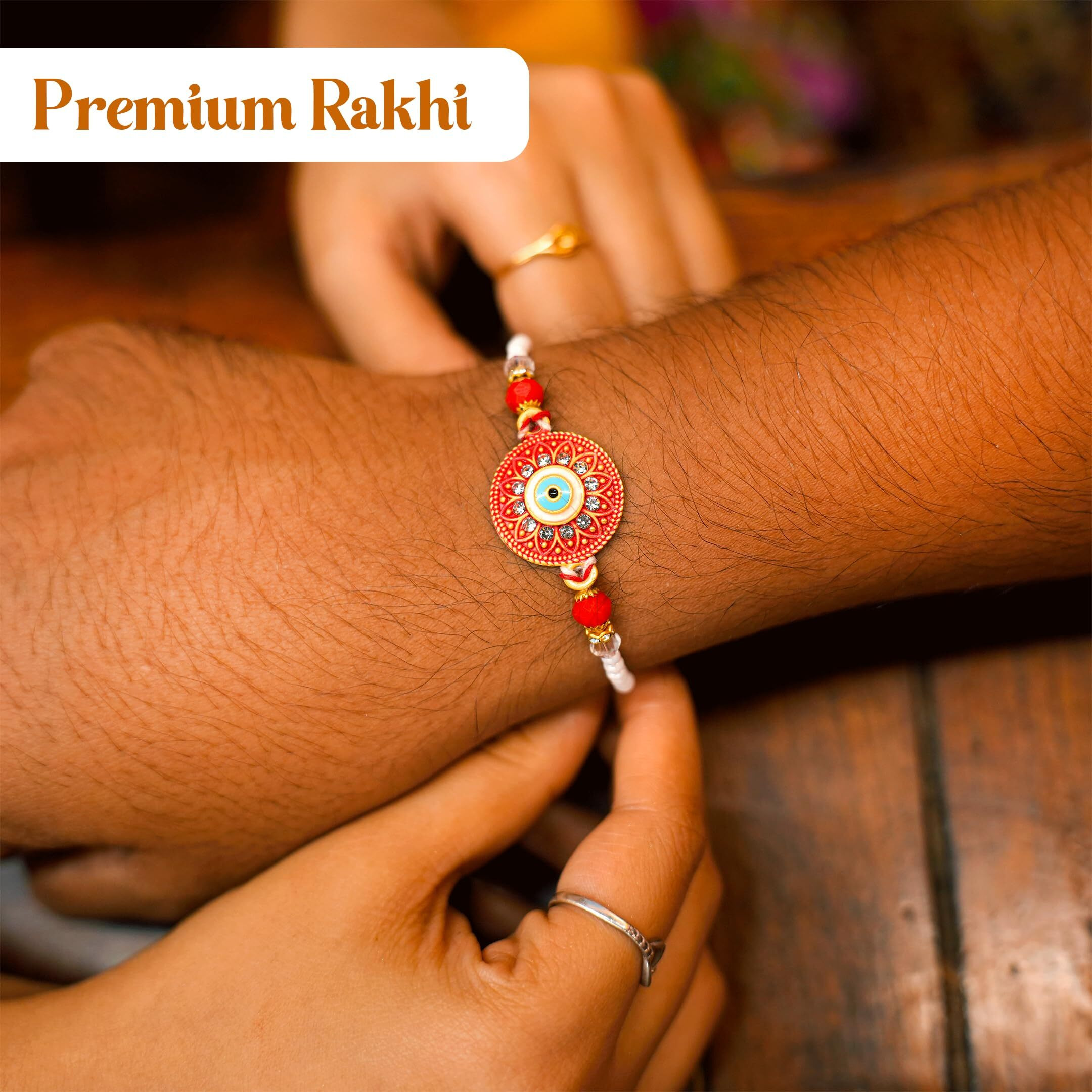 Eat Anytime Pyaari Nok Jhok | Gift Hamper For Brother | 12 Items - Premium Red Rakhi, Hazelnut Dry Fruit Laddoo, Dry Fruit Mix, Millet Bars & More | Rakhi Combo Gift Hamper For Bhaiya