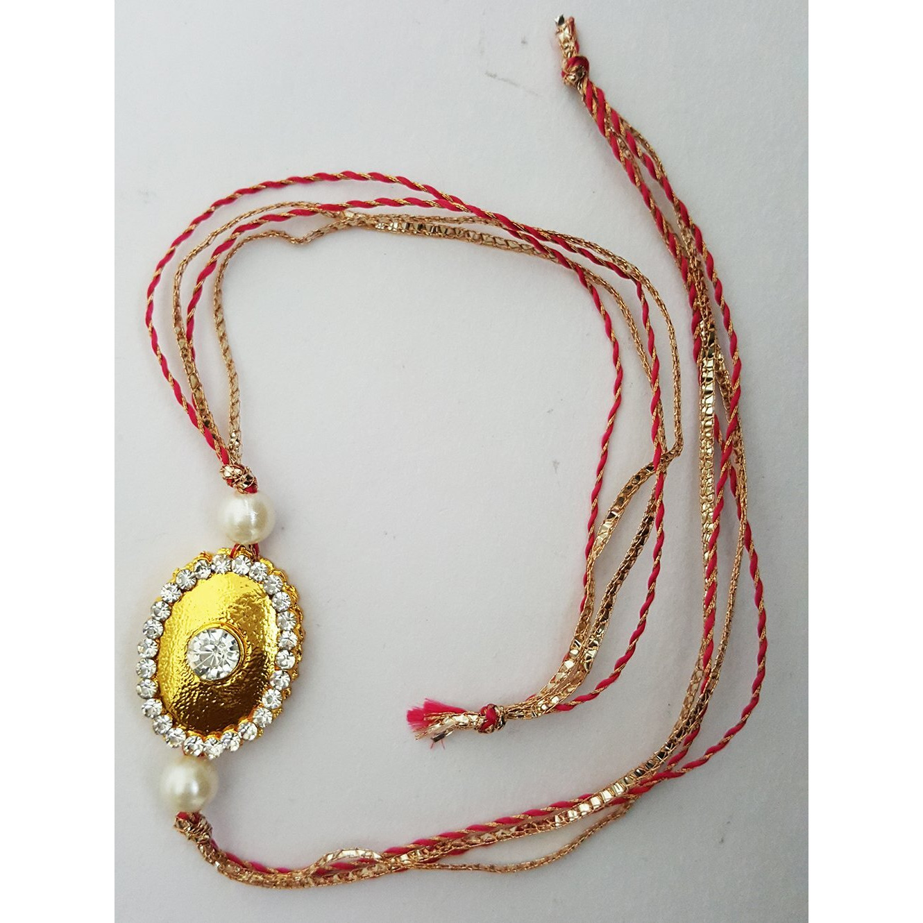 Mehrunnisa Set Of 2 Handmade Exquisite Gold Plated Pearl Crystal Rakhis With Roli Chawal (Rak1128)