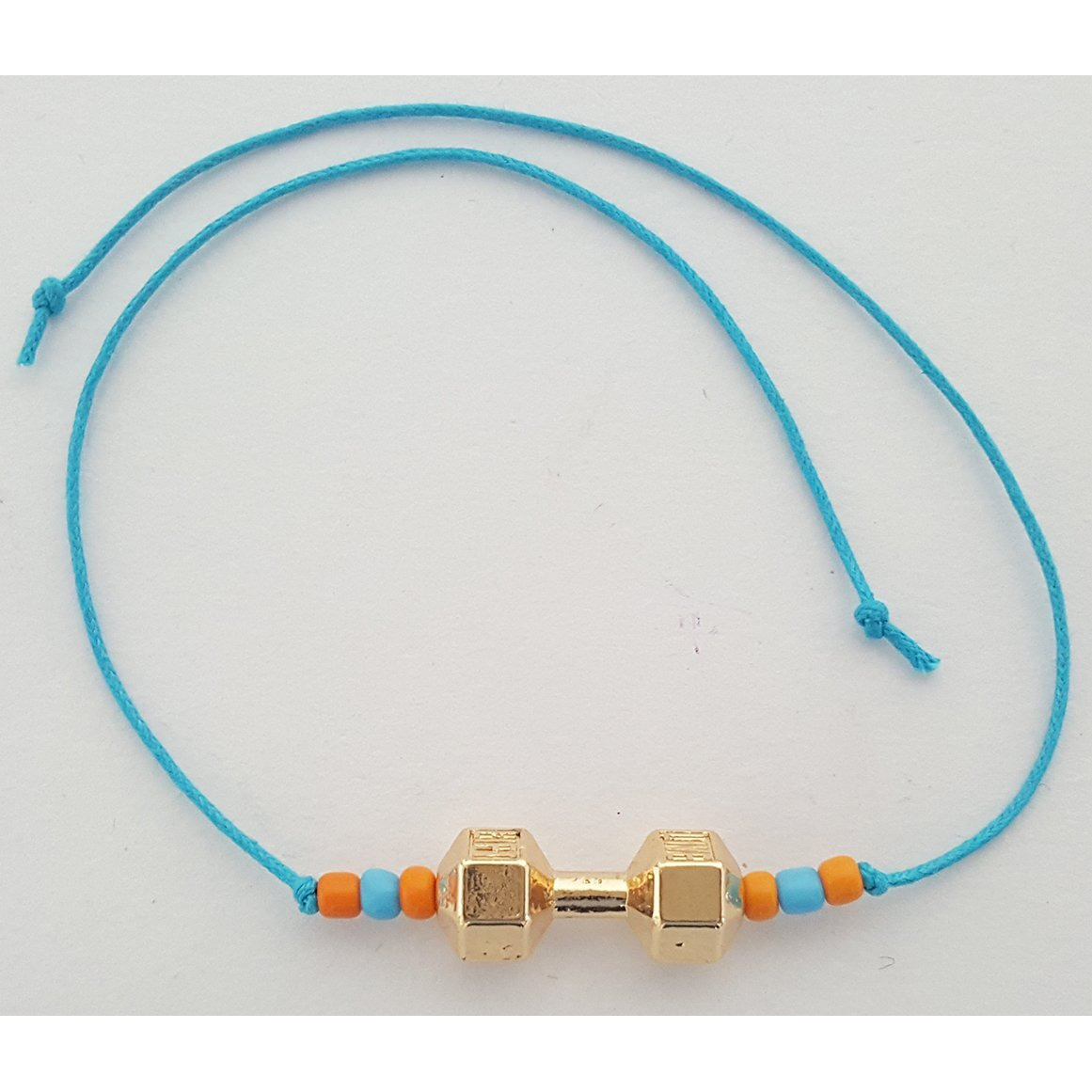 Mehrunnisa Handmade Rose Gold Tone Dumbbell Rakhi With Roli Chawal (Rak1197)