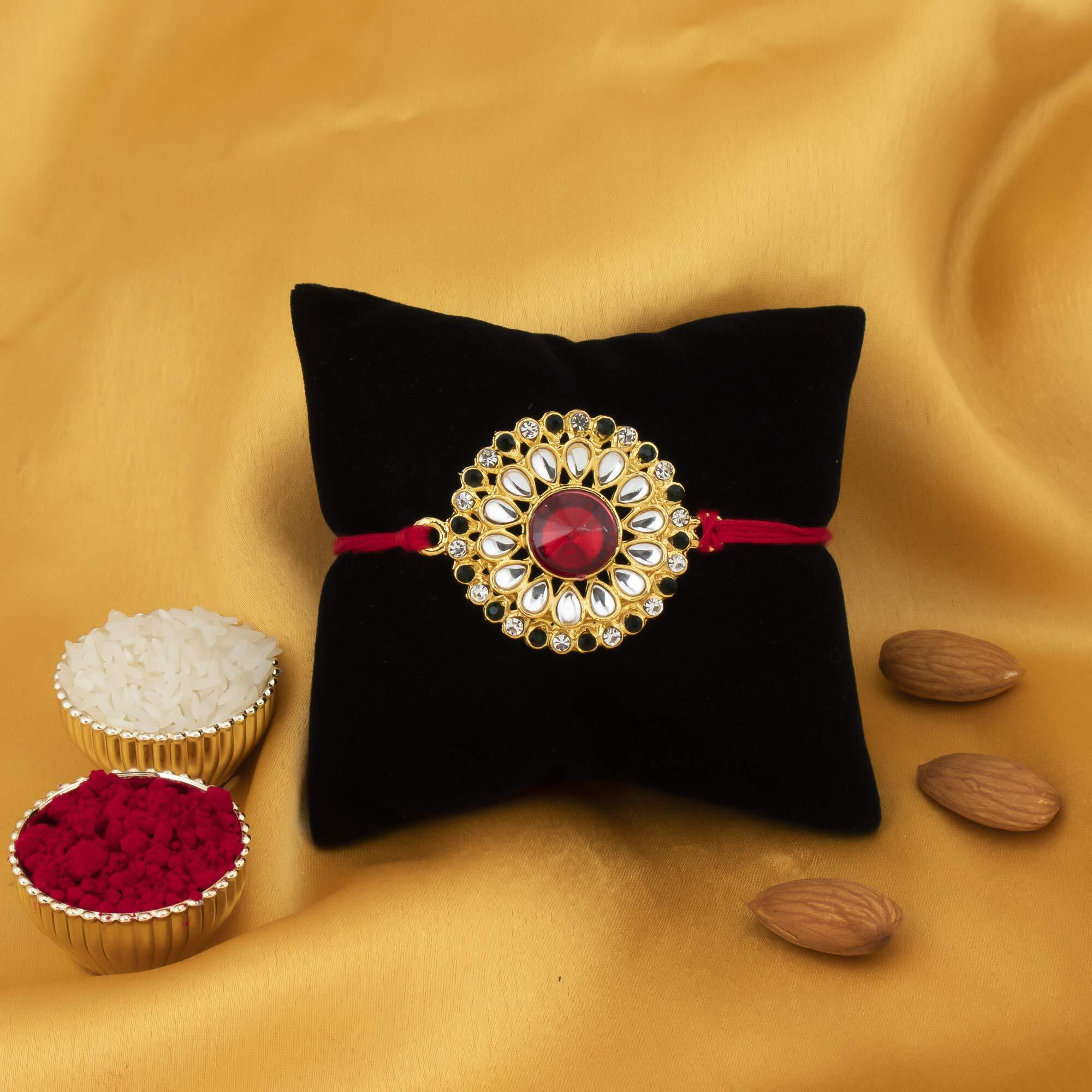 Sukkhi Rakhi Exquisite Kundan Designer Gold Plated Premium Rakhi For Brother With Roli Chawal & Greeting Card | Rakhi For Bhaiya | Rakhi For Men | Kundan Rakhi | (Rak73432)
