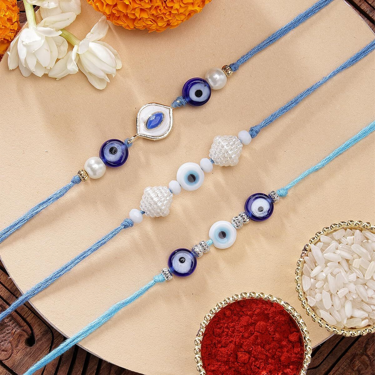 Karatcart Set Of 3 Handmade Meenakari Evil Eye Kundan Rakhis For Brother With Roli & Chawal