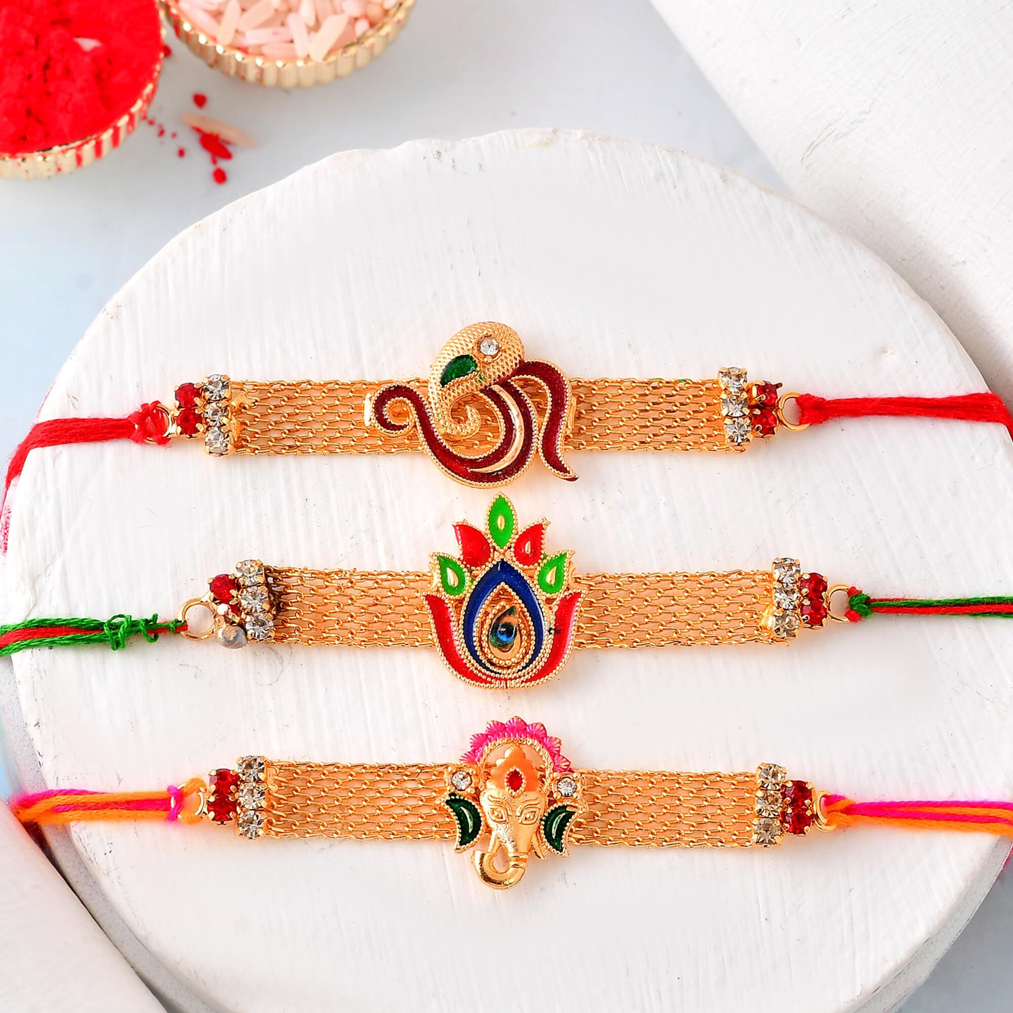 Craftvatika Rakhi Set For Brother | Rakhi For Brother Set Of 3, Ganesha, Om And Lotus Rakhi For Bhai Boy Men Bhaiya | Bracelet Rakhis, Rakshabandhan Rakhis With Best Wishes Card Tilak Set