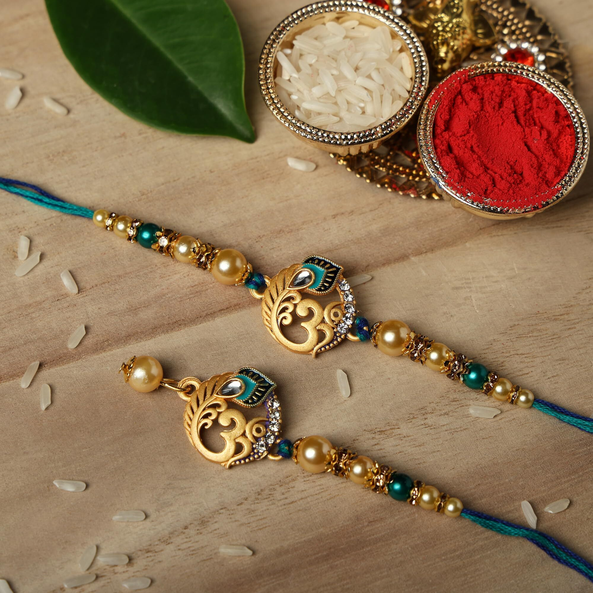 Riddhika Ventures Glorious Gold Plated Om And Diamond Ring Bhaiya Bhabhi Rakhi Set With Roli Chawal And Greeting Card (B3B3)