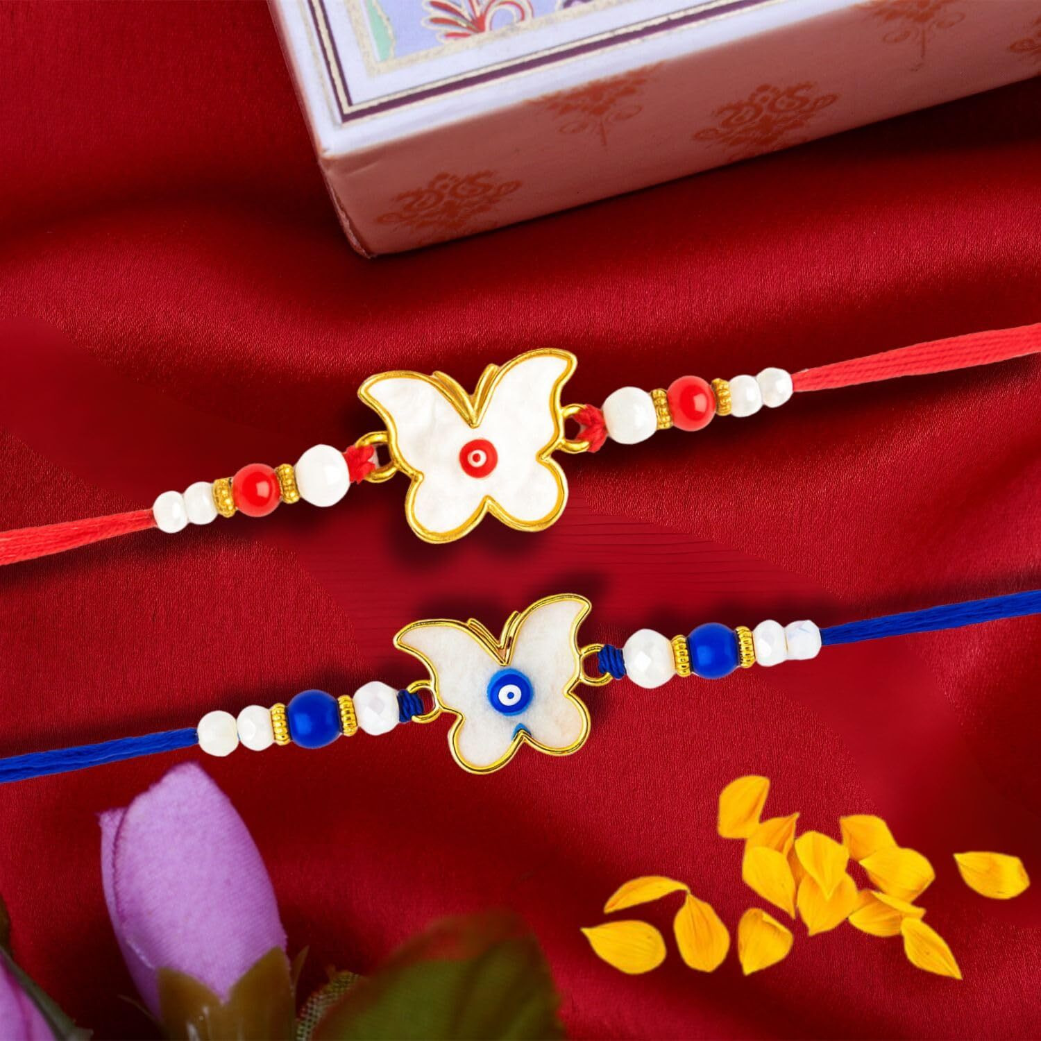 Riddhika Ventures Evil Eye Rakhi Protect From Negative Energy (Set Of 2) With Roli Chawal, Greeting Card And And One Motivational Keychain (T1U1K)