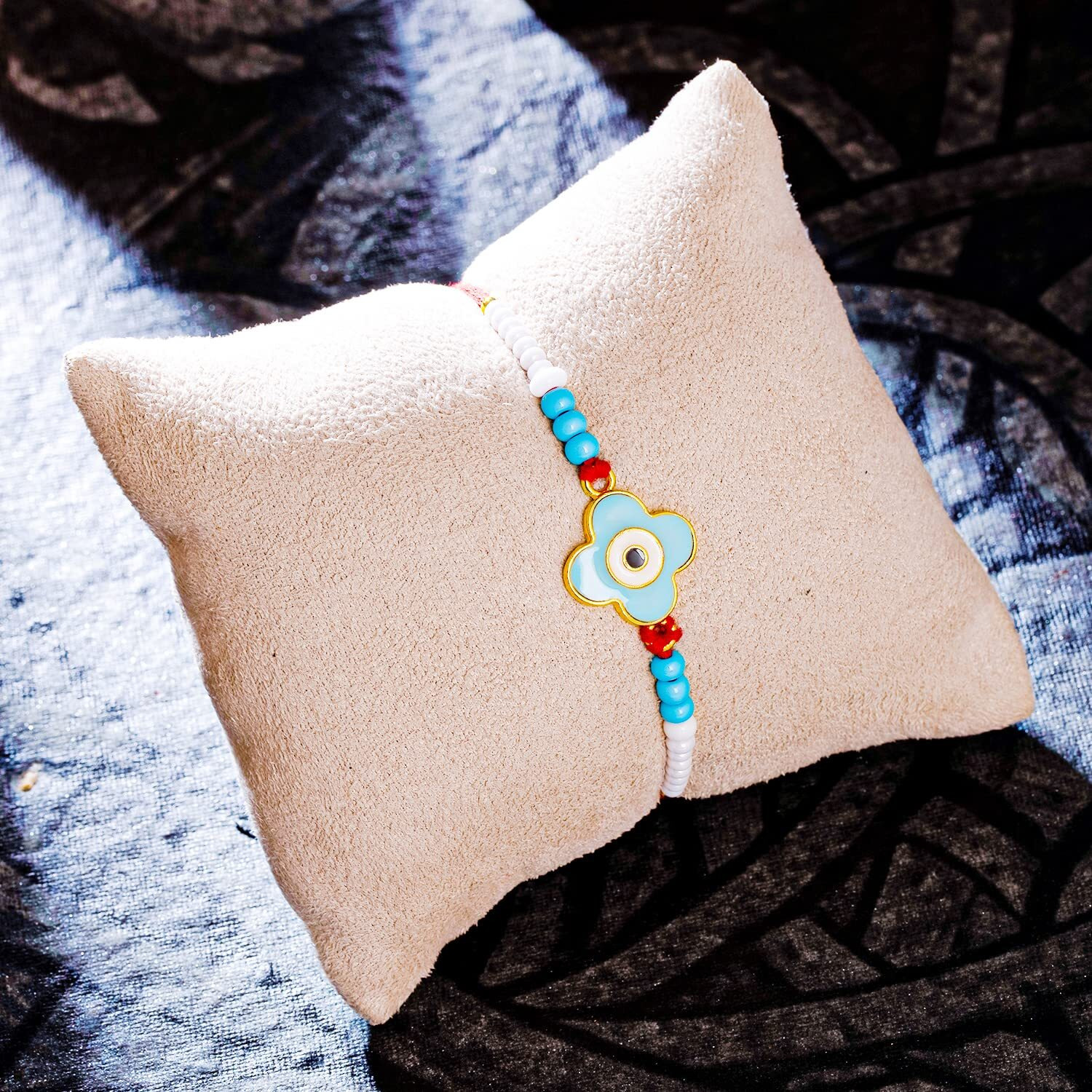 Sukkhi Rakhi Fusion Evil Eye Meenakari Premium Rakhi For Brother With Roli Chawal & Greeting Card | Rakhi For Bhaiya | Rakhi For Men | Evil Eye Meenakari Rakhi | Evil Eye Rakhi | (Rak104460)