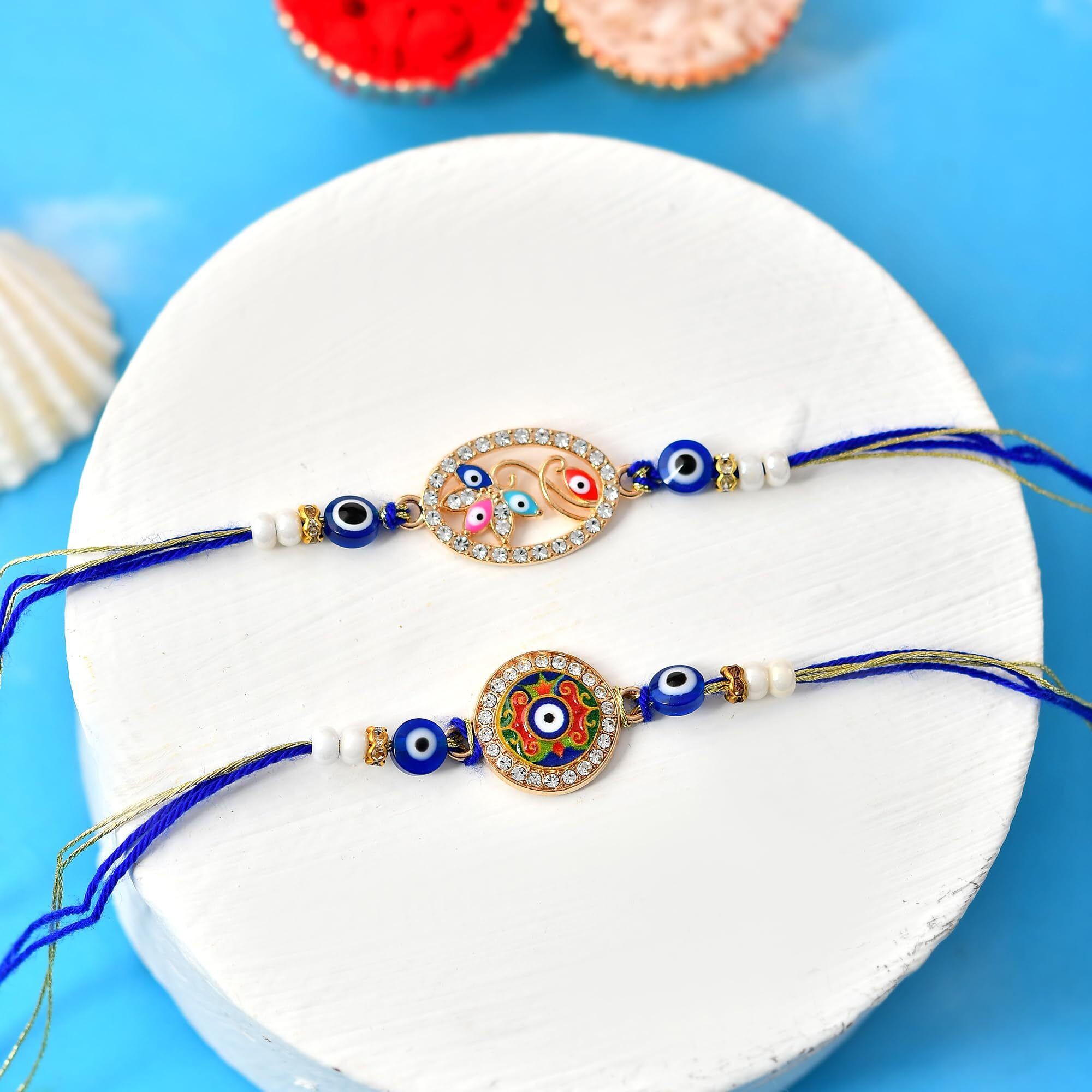 Craftvatika Evil Eye Rakhi Set For Brother Boy Men, Evil Eye Rakhi Set Of 2 For Brother, Rakshabandhan Rakhis, Designer Evil Eye Bracelet, Rakshasutra For Bhaiya Men With Best Wishes Card Tilak Set