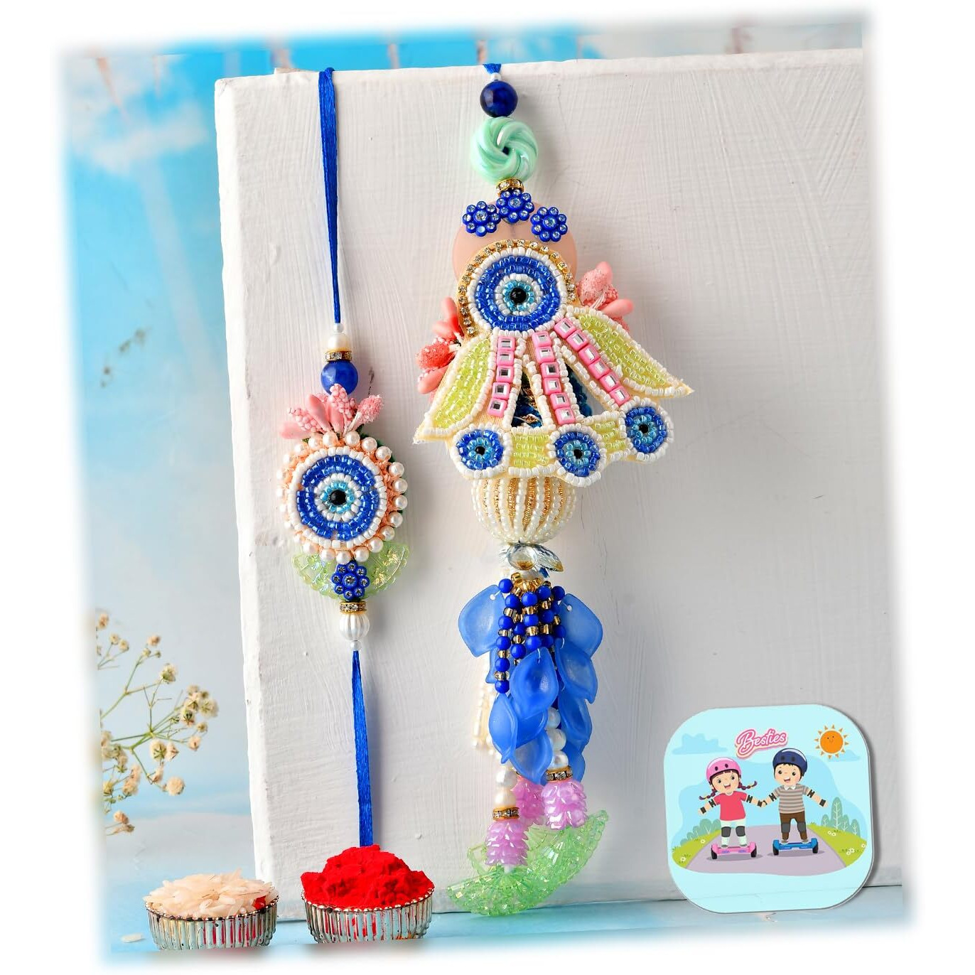Craftvatika Premium Evil Eye Rakhi Set For Brother Bhabhi | Designer Rakhi Set For Bhaiya Bhabhi Evil Eye Lumba Couple Pair With Fridge Magnet Gift, Rakshabandhan Greeting Card, Tilak Set, Home Decor