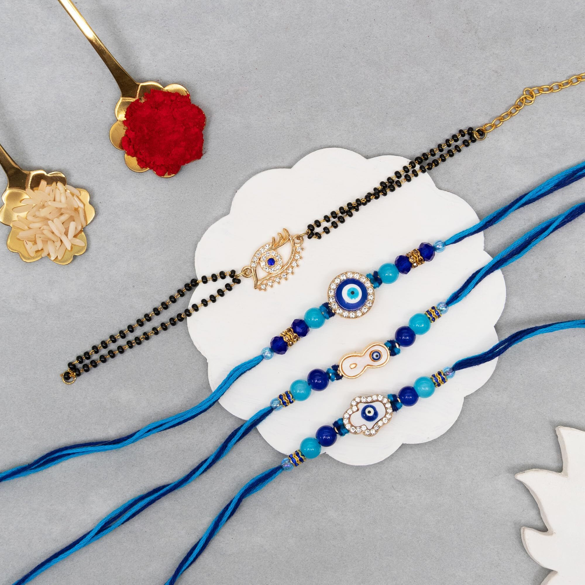 To The Nines Evil Eye Bhaiya Bhabhi Rakhi Set With 2 Rakhi For Kids Greeting Card & Tilak Material  Lumba Set