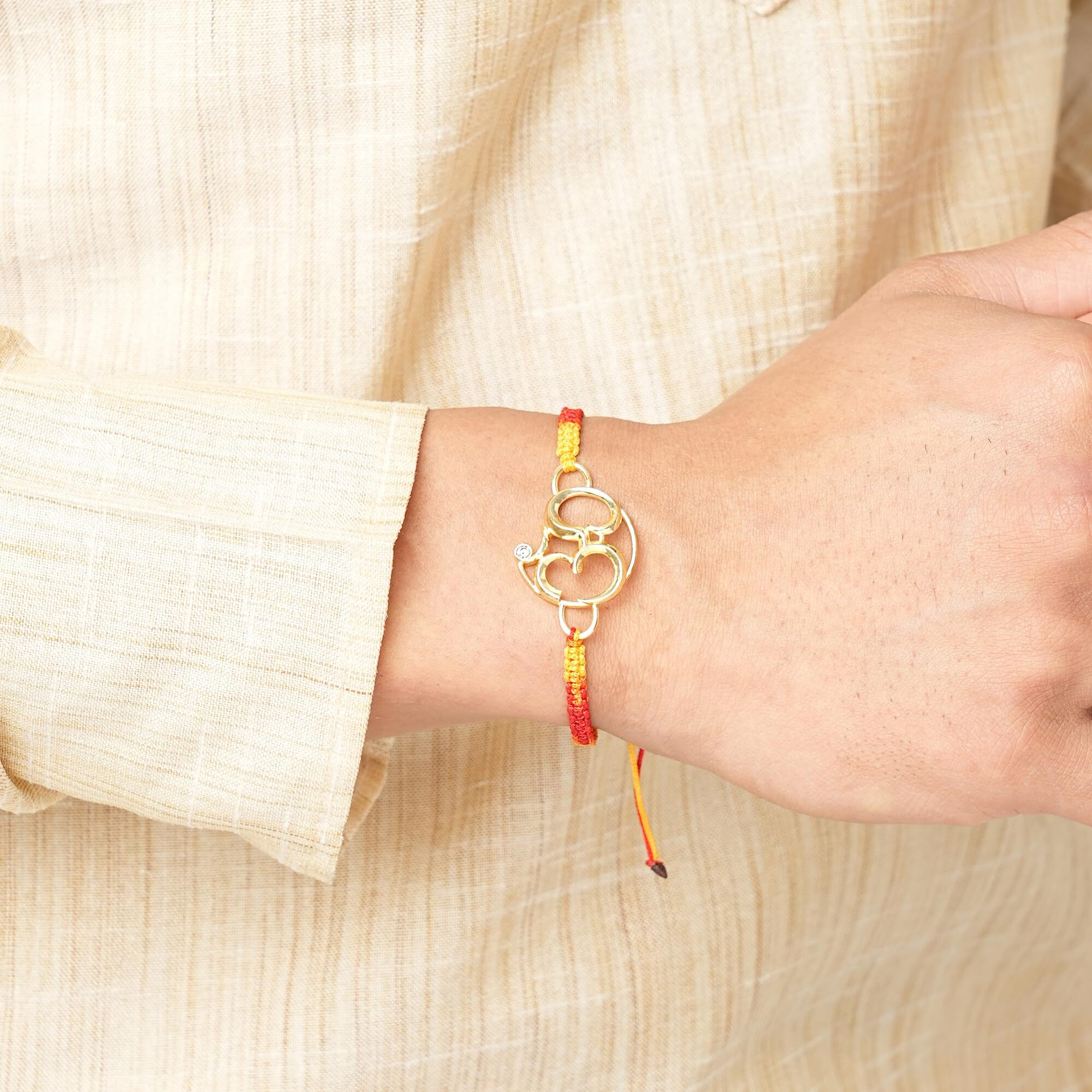 Minutiae Mens Rakhi Gift For Brother With Gold Plated Om Pendant | Religious And Designer Rakhi Bracelet For Raksha Bandhan/Rakshabandhan |