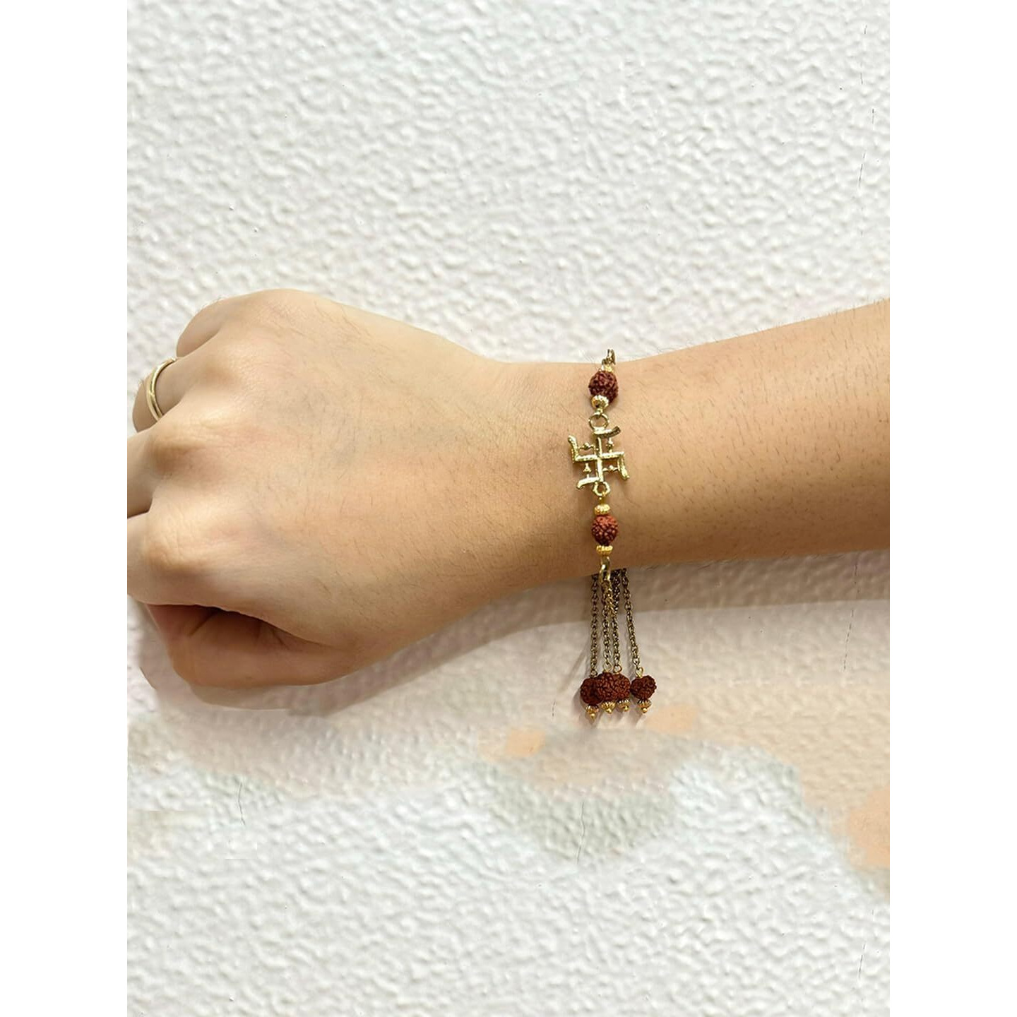 Mahi Gold Plated Swastik And Rudraksha Lumba Rakhi For Bhabhi (Ral1100811G)