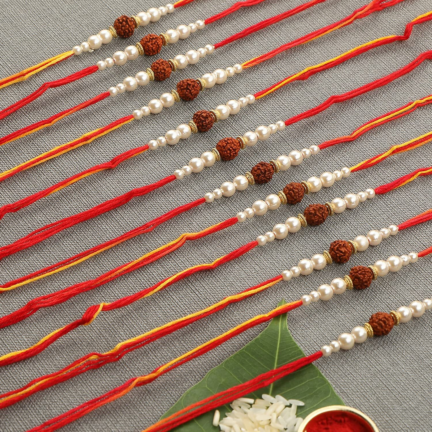 Accessher Traditional Gold Plated Elegant And Stylish Rudraksh Rakhi For Beloved Brother Pack Of 12 With Roli Kumkum Packets And Happy Rakshabandhan Card