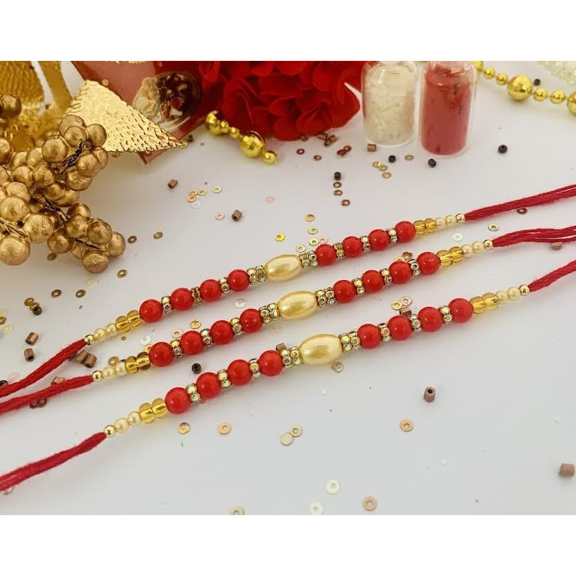 Lazybeee 1Pc Beautiful Red Color Rakhi With Pearl Beads & Stone Ring For Bhai And Bhabhi With A Beautiful Small Packet Of Roli Chawal To Make The Festival Complete Celebrate The Bond Of Sibling Love
