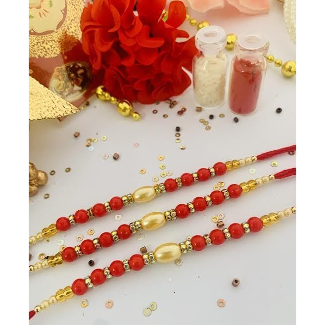 Lazybeee 1Pc Beautiful Red Color Rakhi With Pearl Beads & Stone Ring For Bhai And Bhabhi With A Beautiful Small Packet Of Roli Chawal To Make The Festival Complete Celebrate The Bond Of Sibling Love