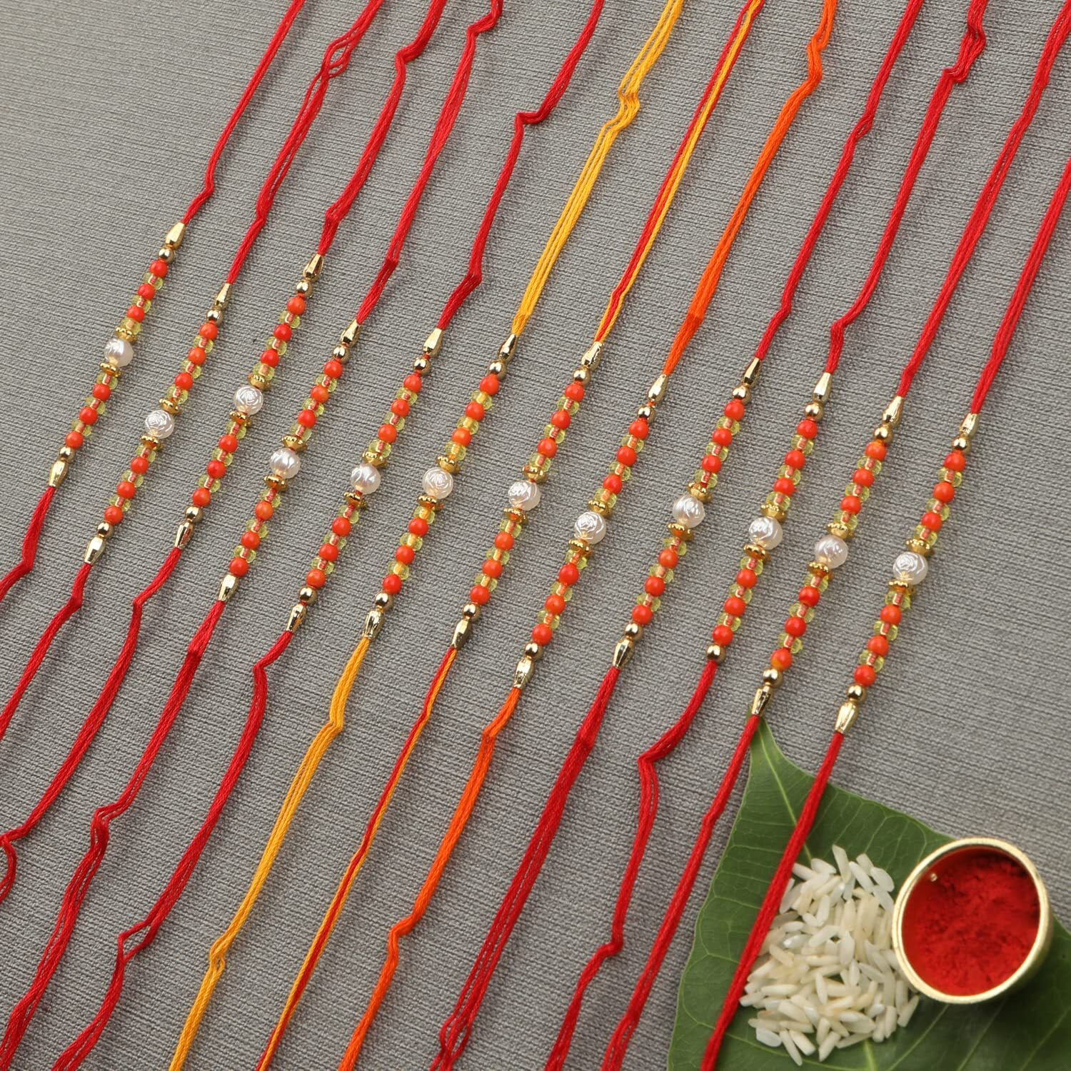 Accessher Traditional Elegant And Stylish Orange Beads Rakhi For Beloved Brother Pack Of 12 With Roli Kumkum Packets And Happy Rakshabandhan Card | Rakhi For Brother