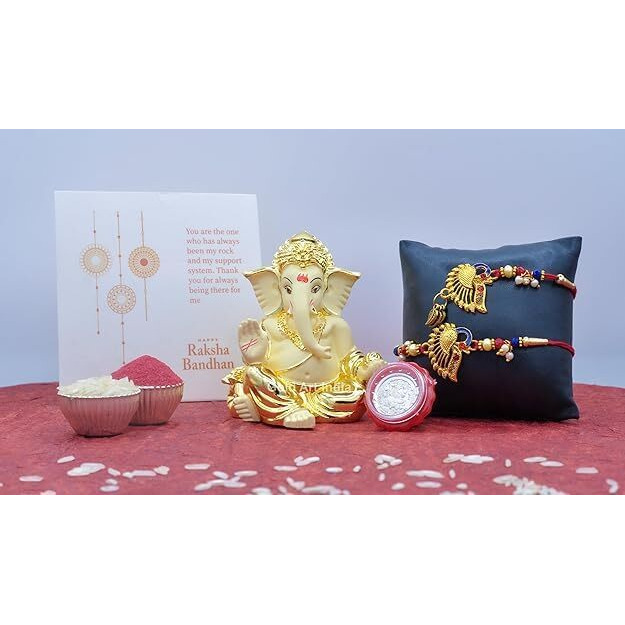 Gold Art India Gaddi Ganesha Idol Combo With Free Peacock Rakhi & Lumba Set, Roli Chawal, Silver Plated Coin, And Gift Card - Perfect Raksha Bandhan Gift