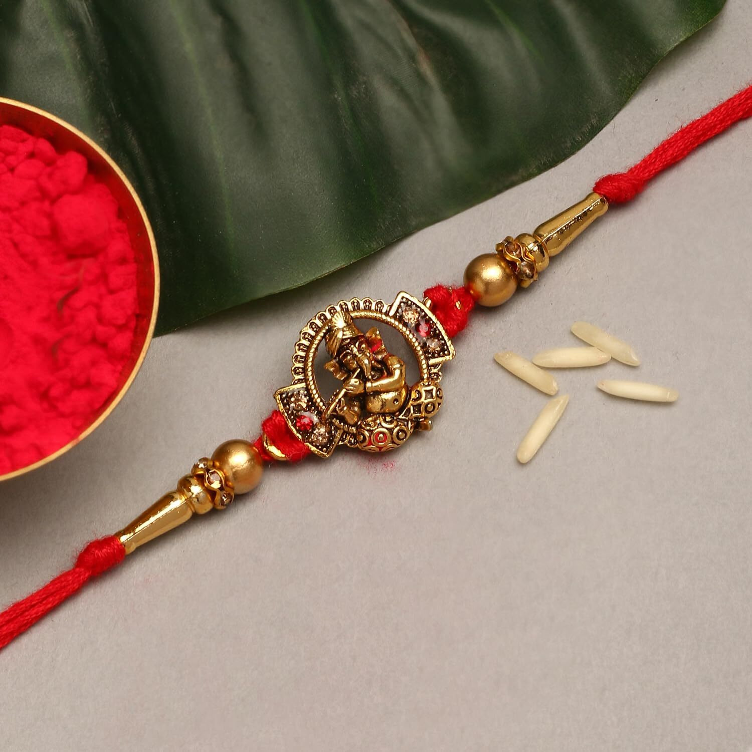 Purple Tree Beautiful Stone Studded Ganesha Rakhi For Brother With Roli Chawal And Card