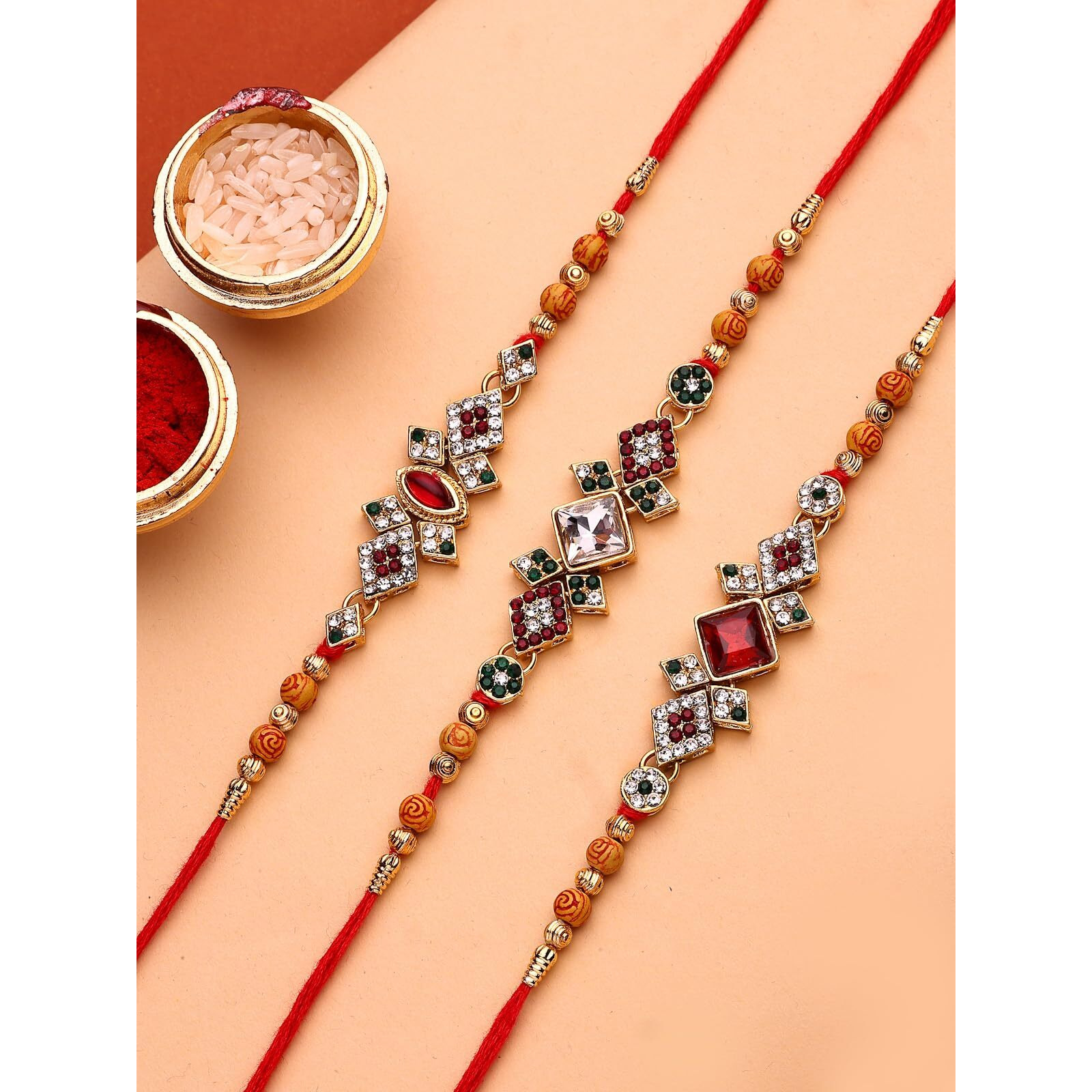 Sukkhi Rakhi Festive Gold Plated With Ad Stones Handmade Multicolor Combo Rakhi For Brother With Roli Chawal & Free Greeting Card|Set Of 3|Cbrak107447