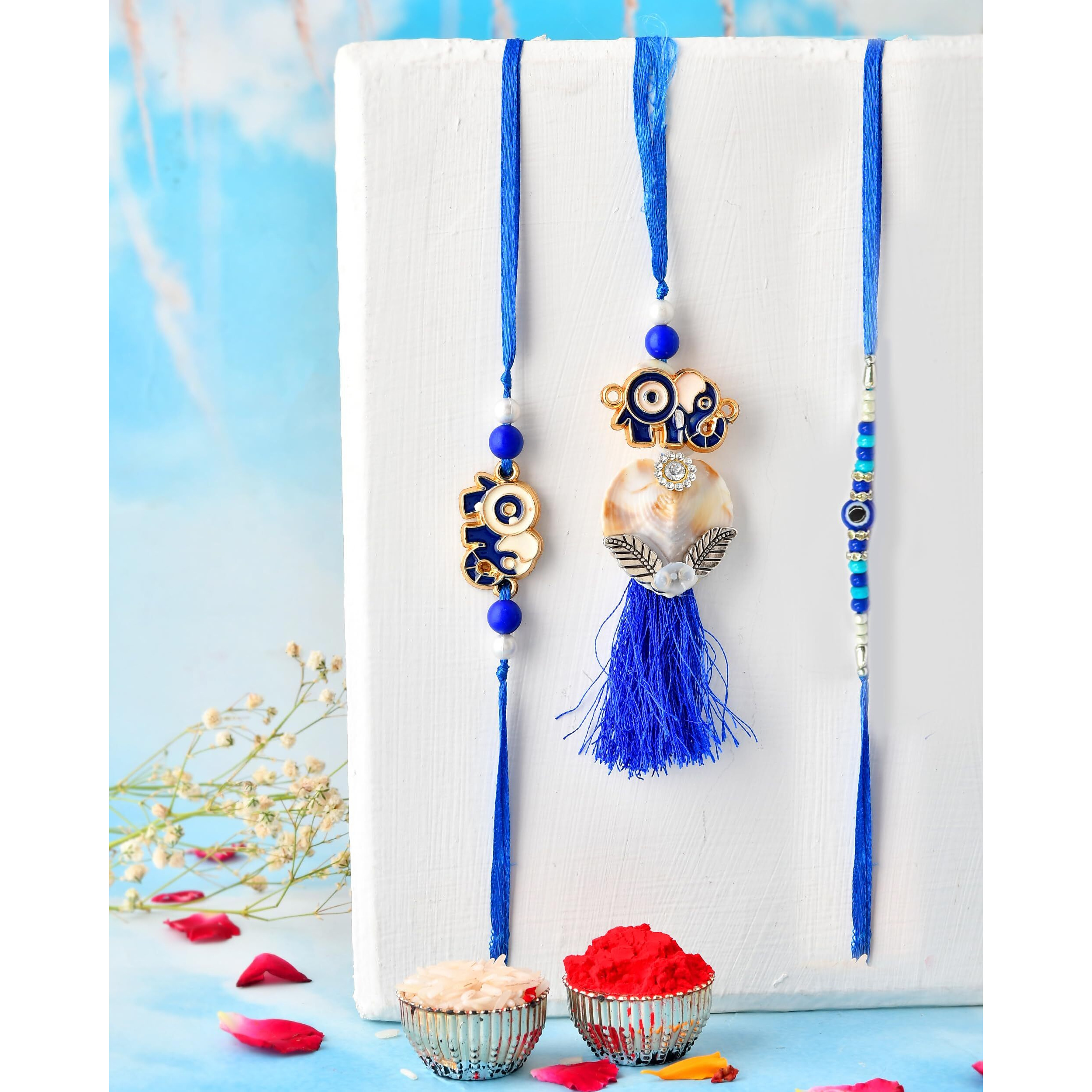 Craftvatika Evil Eye Rakhi Set Of 3 For Brother Bhabhi Kids, Rakhi Set Of 3 For Bhaiya Bhabhi Kids, Rakhis For Men Women, Evil Eye Lumba, Elephant Rakhis For Kid With Best Wishes Card
