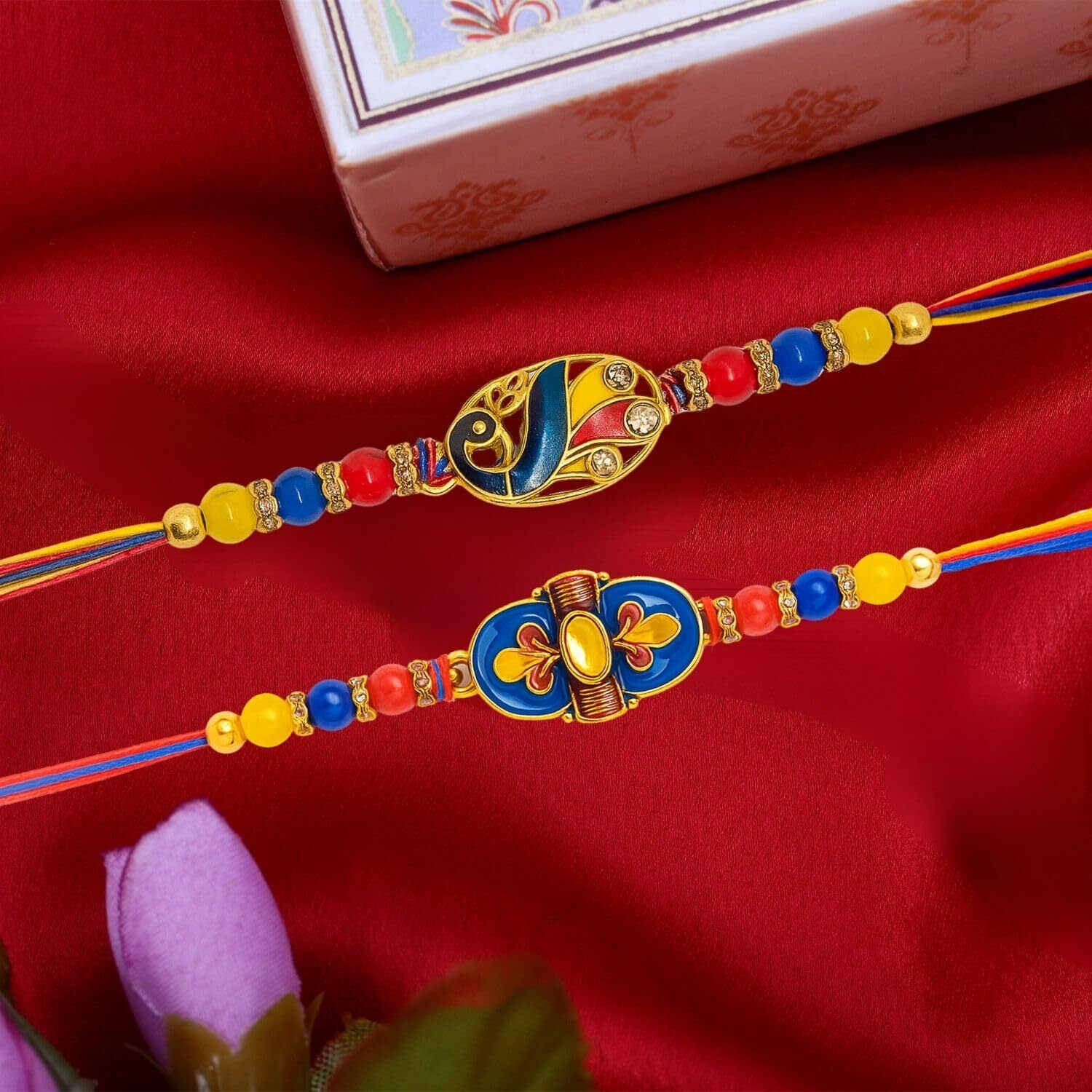 Riddhika Ventures Elegant Gold Plated Meenakari Rakhi (Set Of 2) With Roli Chawal, Greeting Card And And One Motivational Keychain (A1B1K)