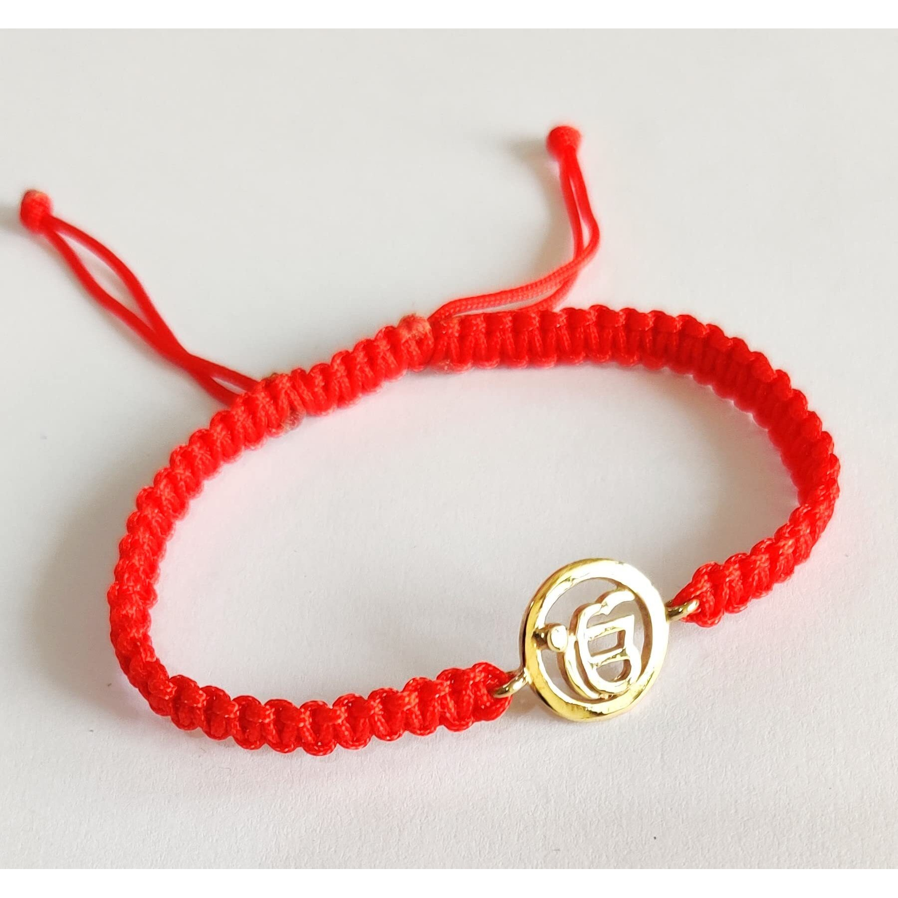 Aumkaara Gold Plated Ik Onkar Rakhi