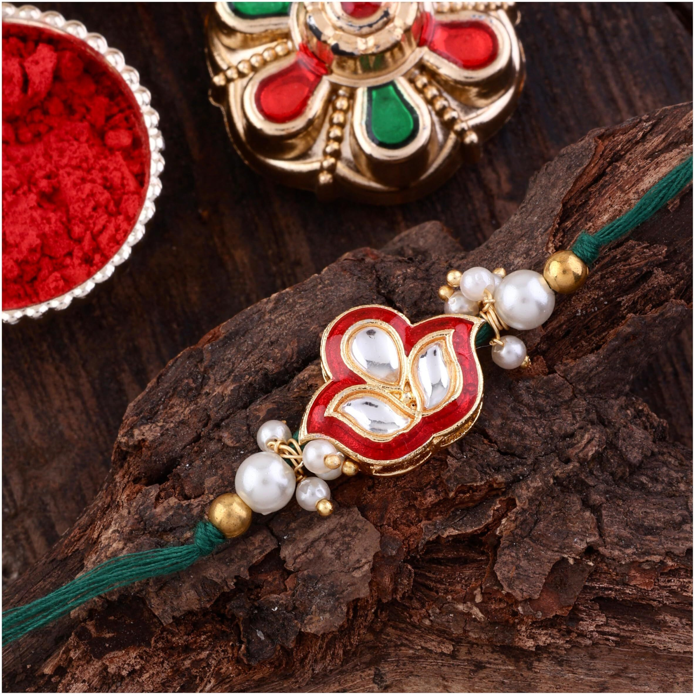 Shonas Style Elegant Pearl Rakhi With Red Thread, Gold-Plated Lotus Design And Crystal Stones (Red)