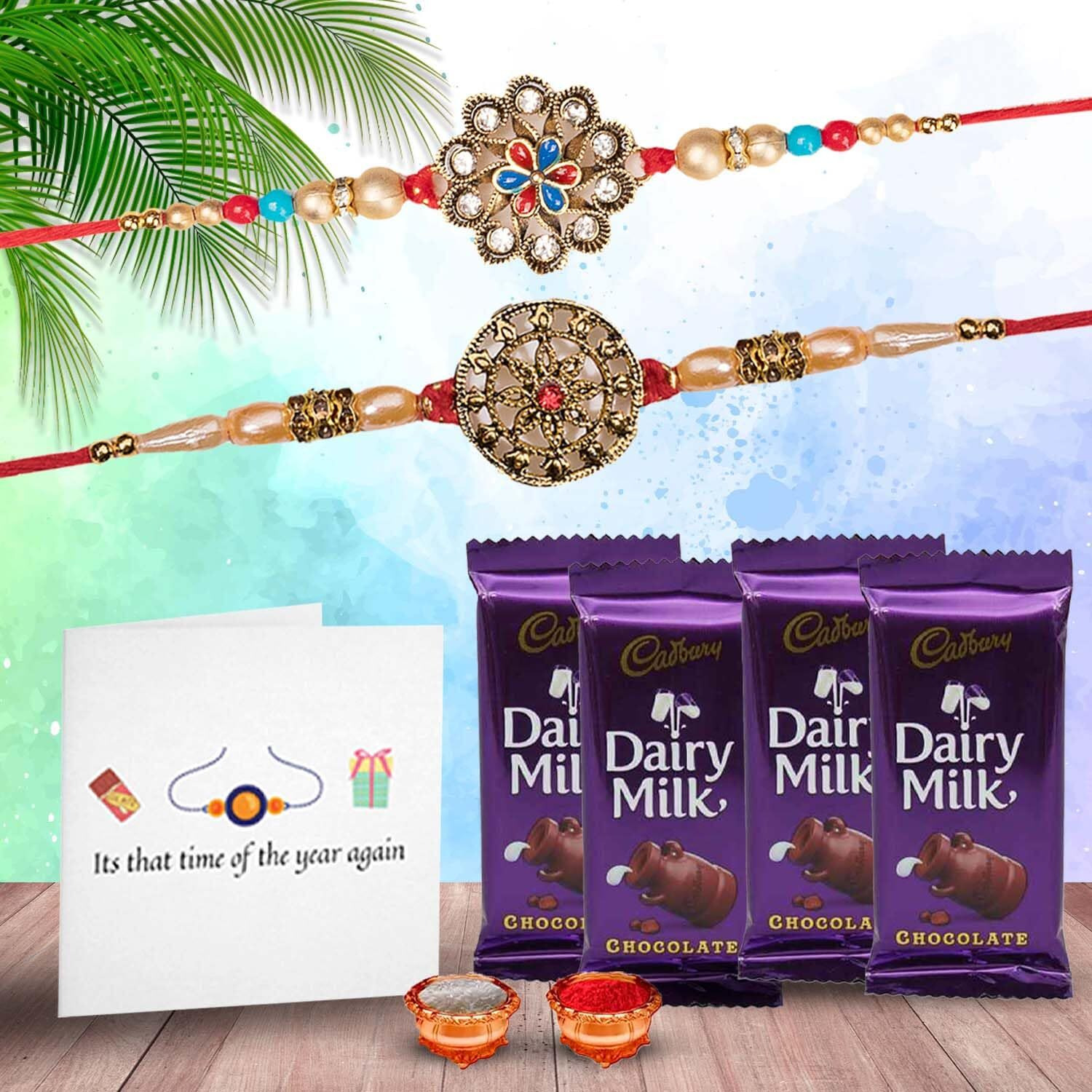 Gifticon Rakhi With Chocolate For Brother Set Of 2 Rakhi 4 Dairy Milk Chocolate Roli Chawal Greeting Card | Gift Box | Ib-4Dm-2R-Rndflwr-Pdl23