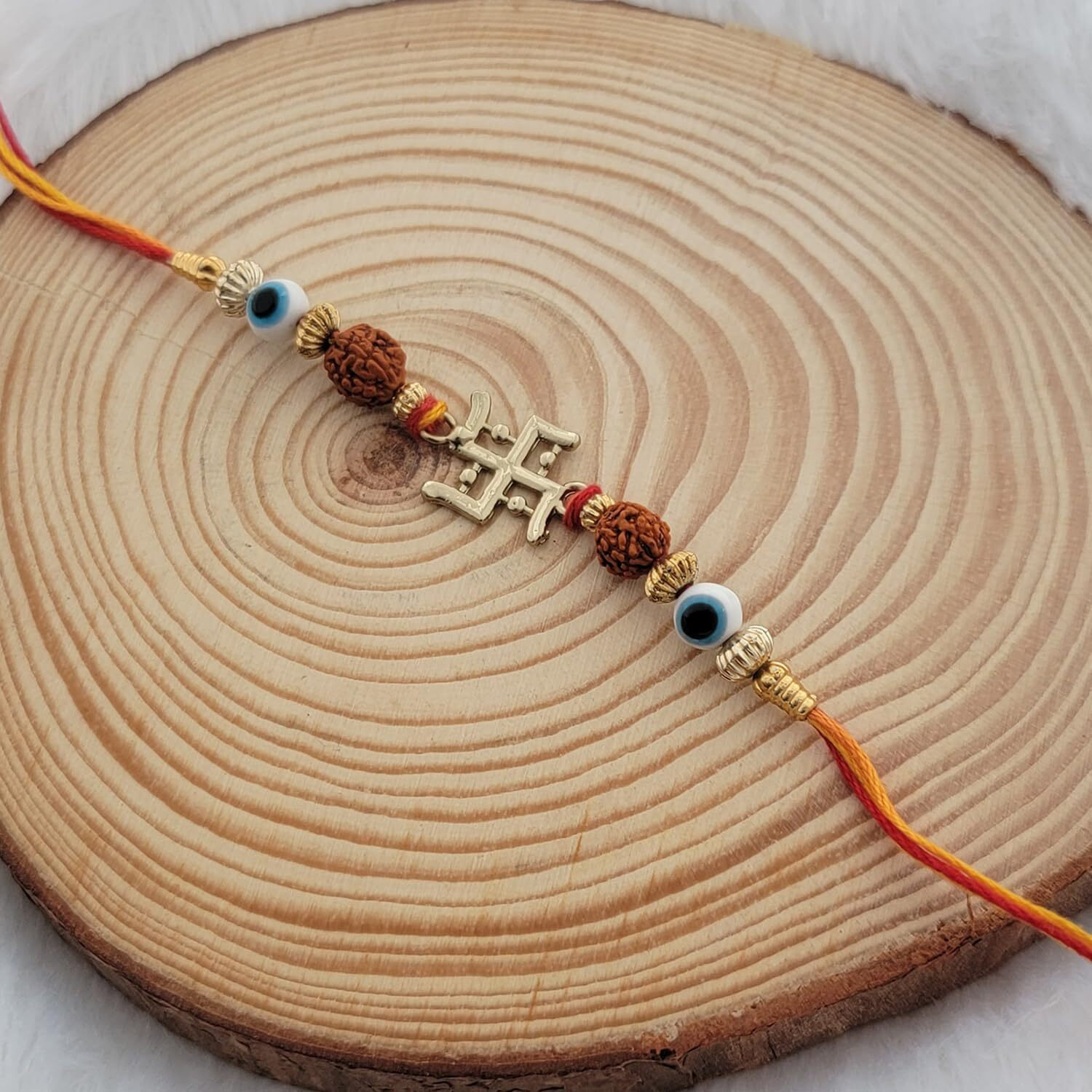 Mahi Gold Plated Evil Eye And Swastik Rudraksha Rakhi For Brother (Ra1100726G)