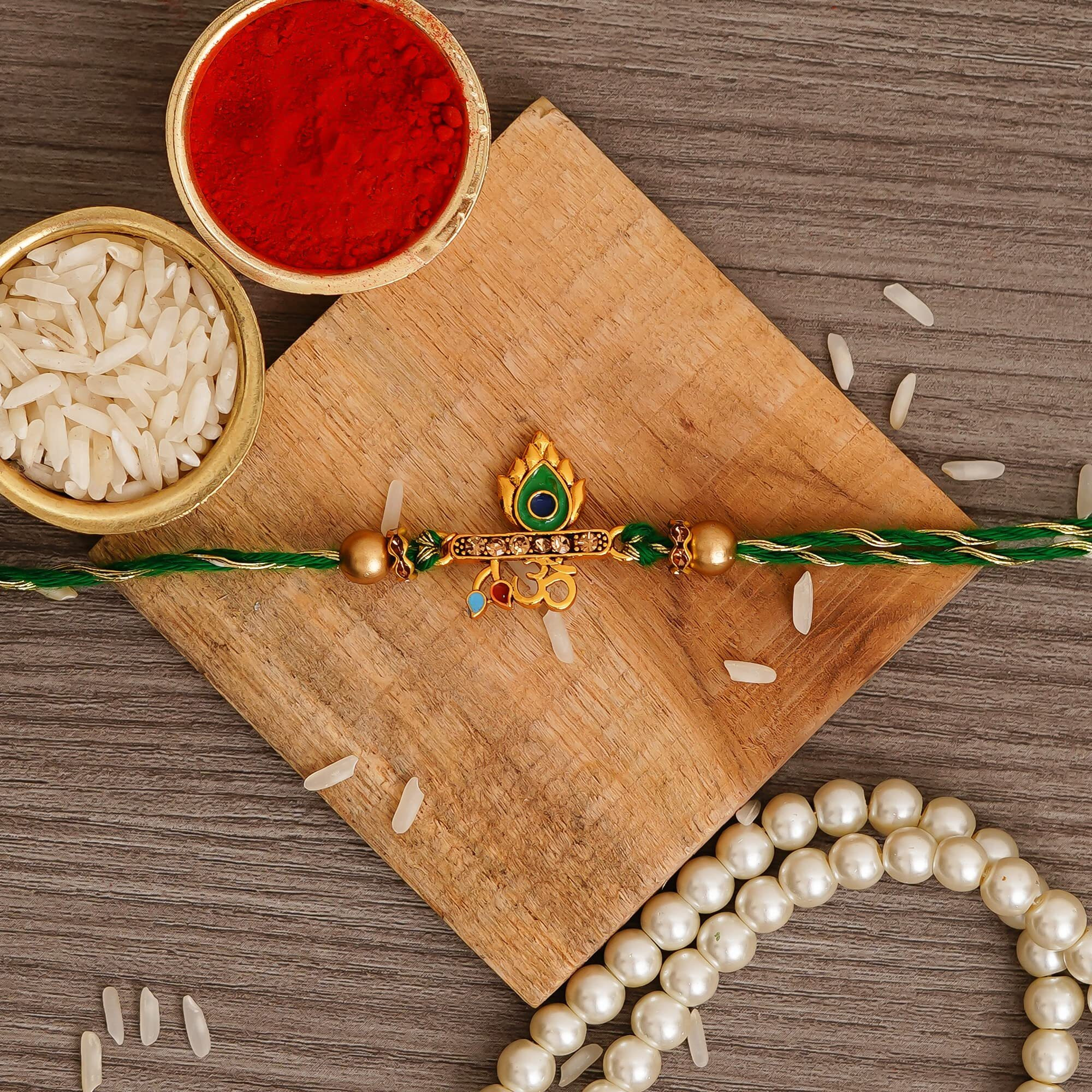 Ecraftindia Green & Golden Om & Peacock Feather Religious Designer Rakhi With Roli Chawal Pack - Rakhi For Brother, Bhaiya, Bhai