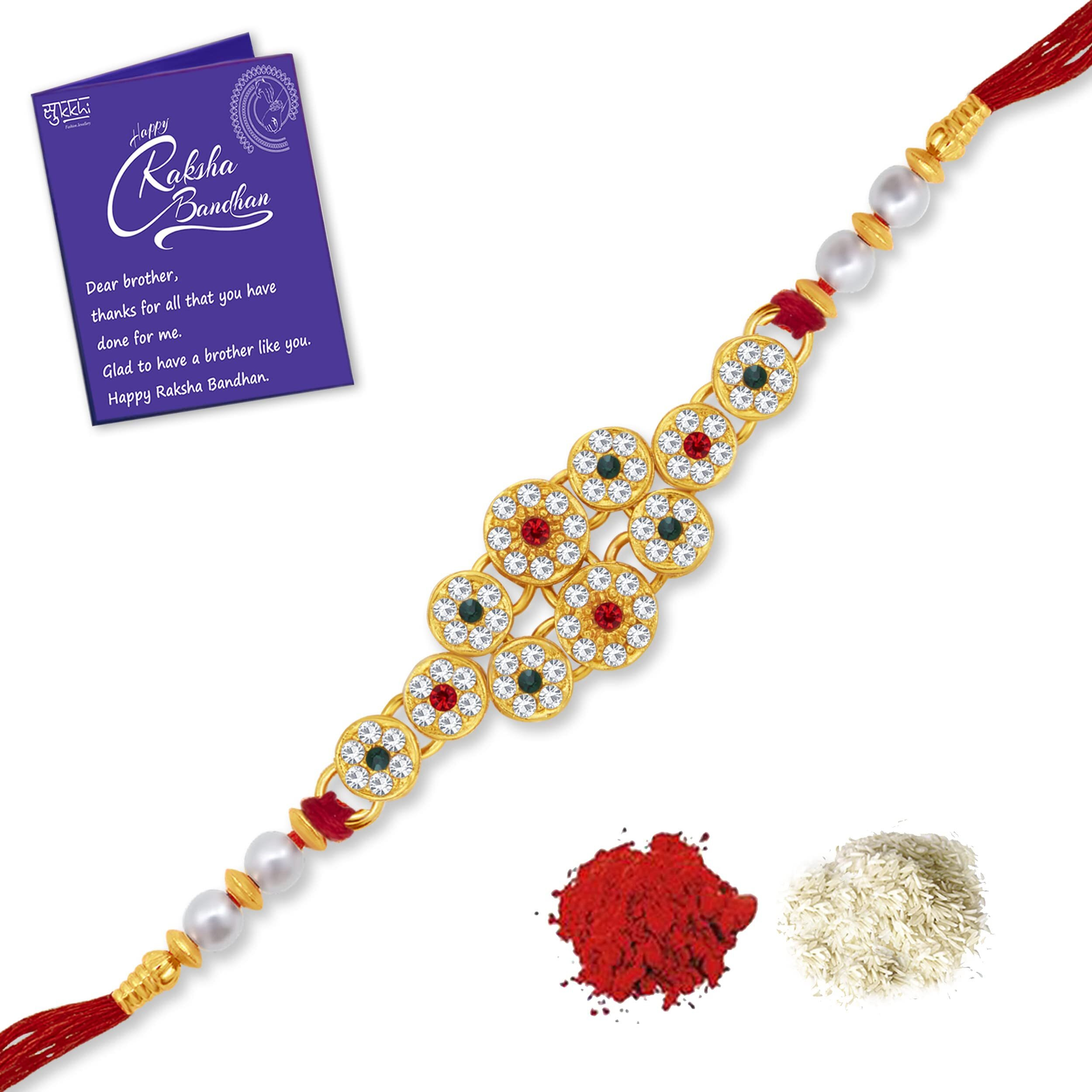 Sukkhi Delightful Kundan Designer Gold Plated Premium Rakhi For Brother With Roli Chawal & Greeting Card | (Rak104487)