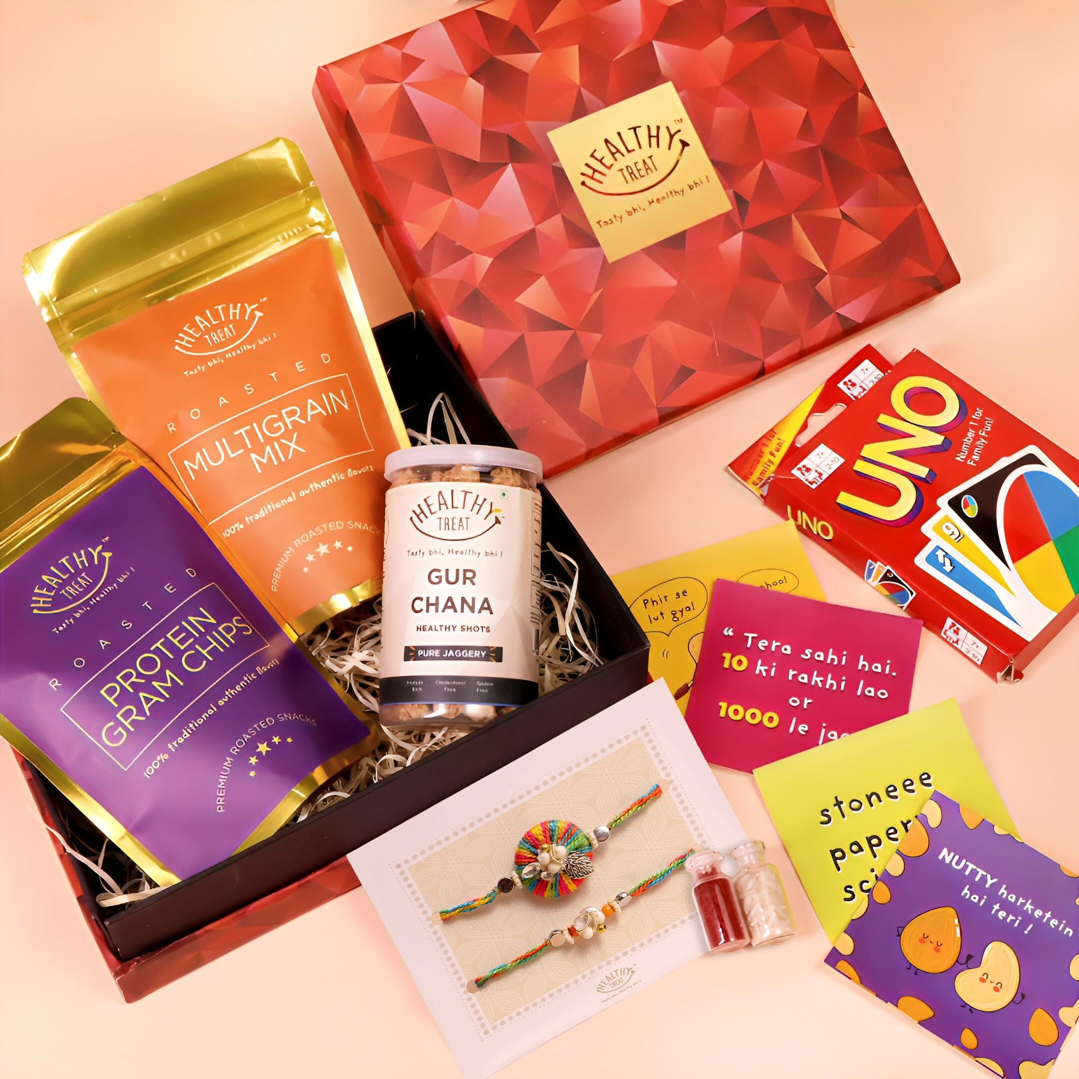 Healthy Treat Snack N Play Rakhi Gift Hamper | Roasted Healthy Snacks Gift Pack | A Pair Of-Rakhi, Roli Chawal, Stickers, Uno Cards | Rakhi's Gifts For Brother And Sister | The Ultimate Assorted Raksha Bandhan Gift Hampers