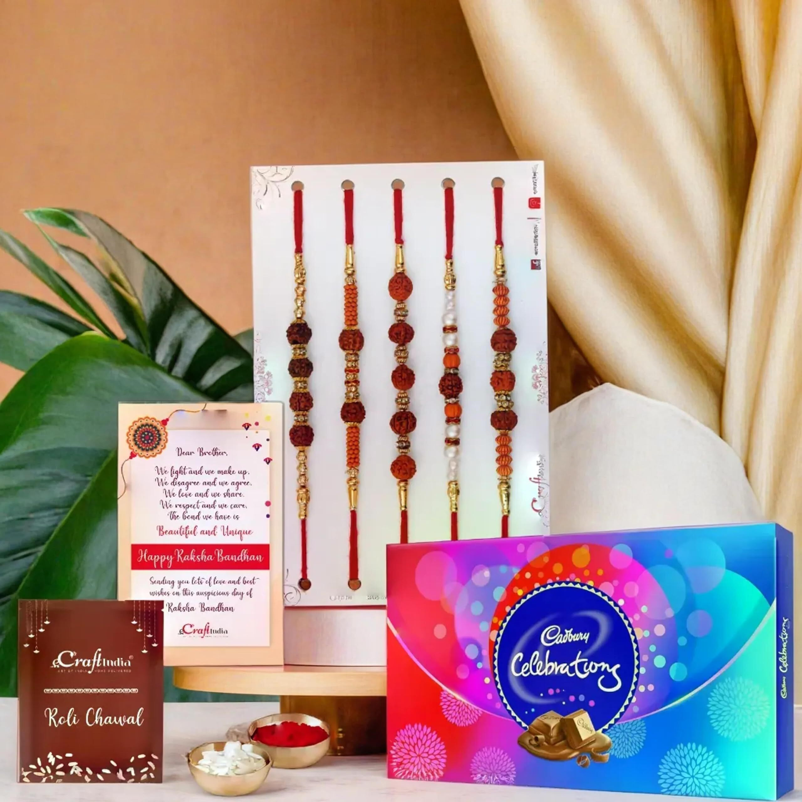 Ecraftindia Set Of 5 Beads, Pearls, Diamond, Rudraksha Rakhis For Brothers With Chocolate, Cadbury Celebrations Gift Pack Of 7 Assorted Chocolates, Rakhi With Chocolate - Roli Chawal Pack