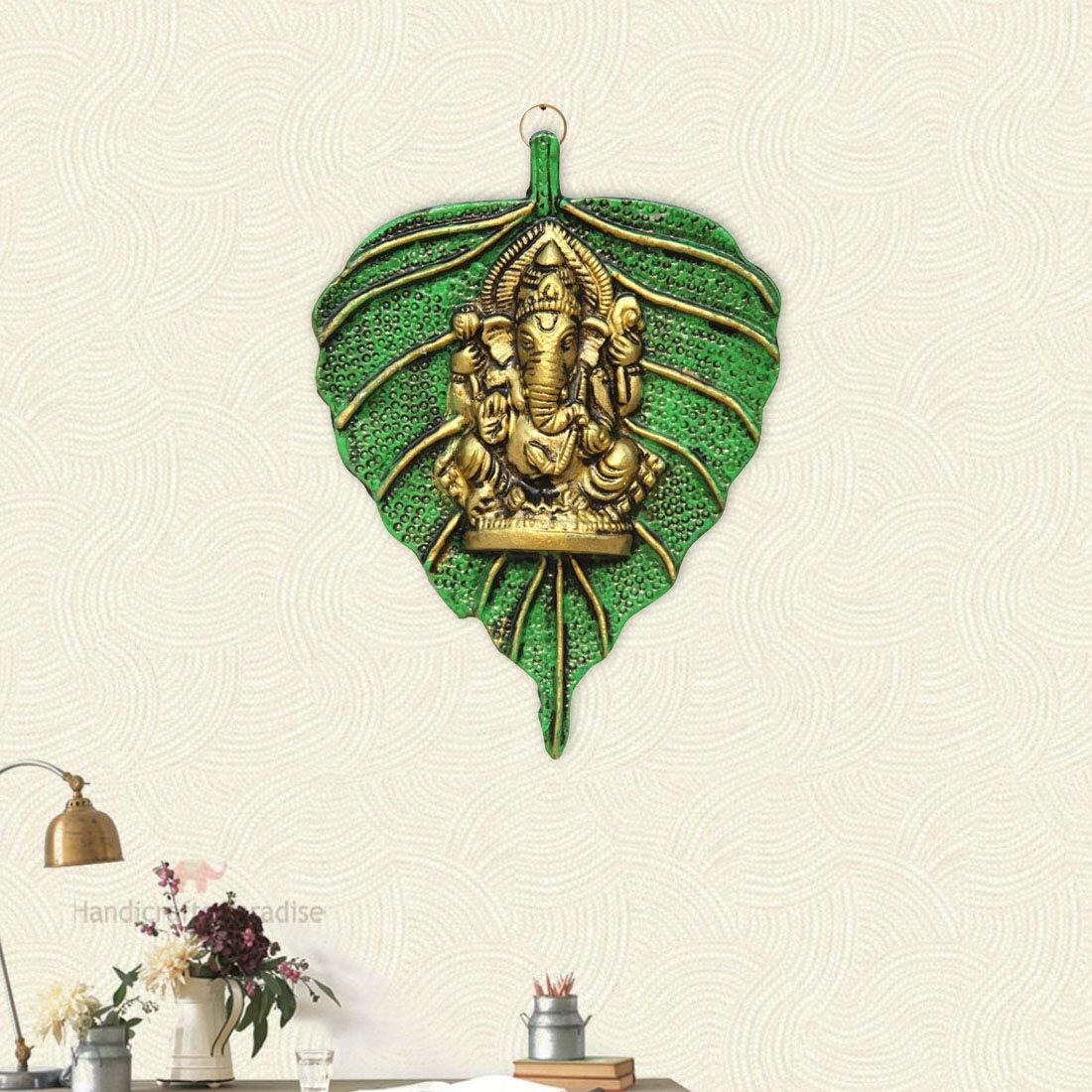 Handicrafts Paradise Ganesha Placed On Leaf Aluminium Metal Wall Hanging (10.2 Cm X 1.9 Cm X 14 Cm)